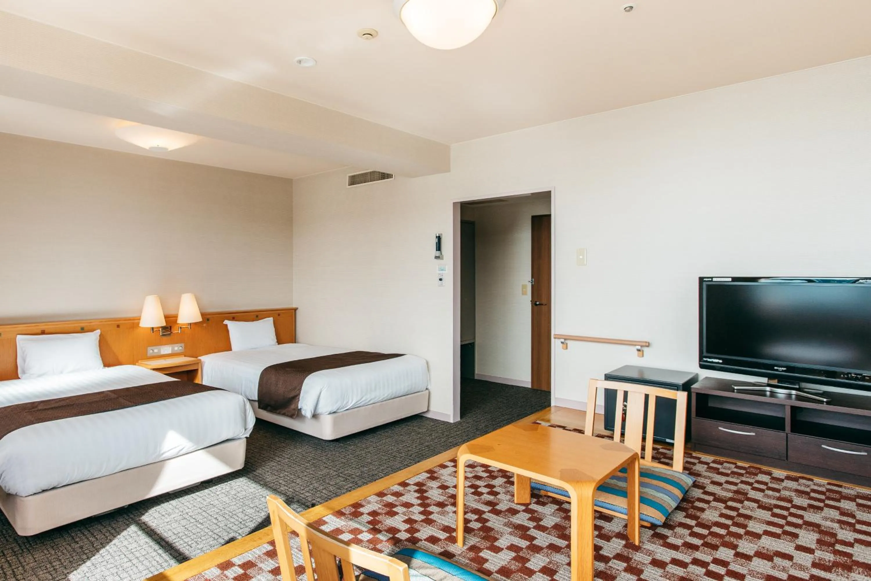 Bed in KAMENOI HOTEL Kii-Tanabe