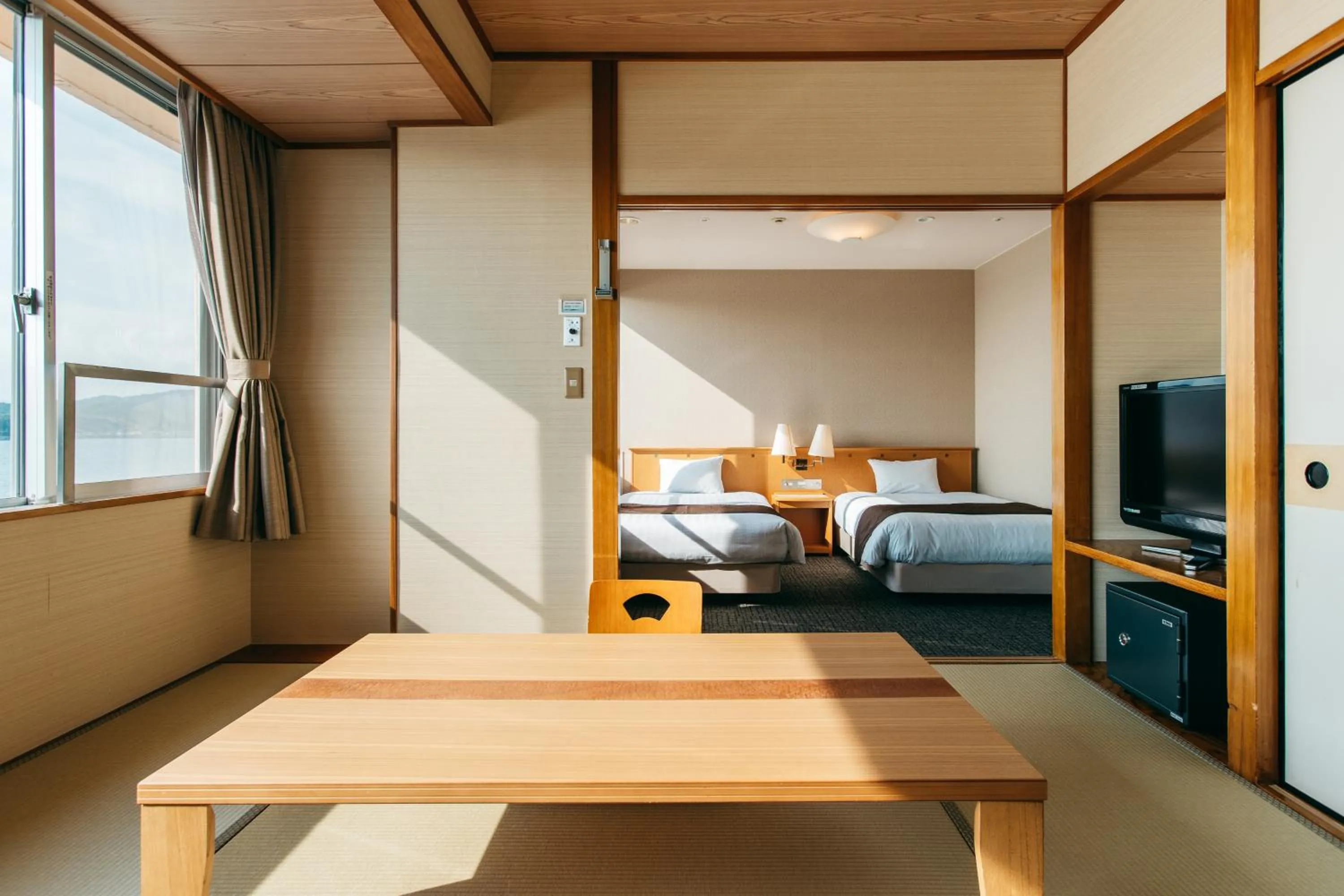 Bed in KAMENOI HOTEL Kii-Tanabe