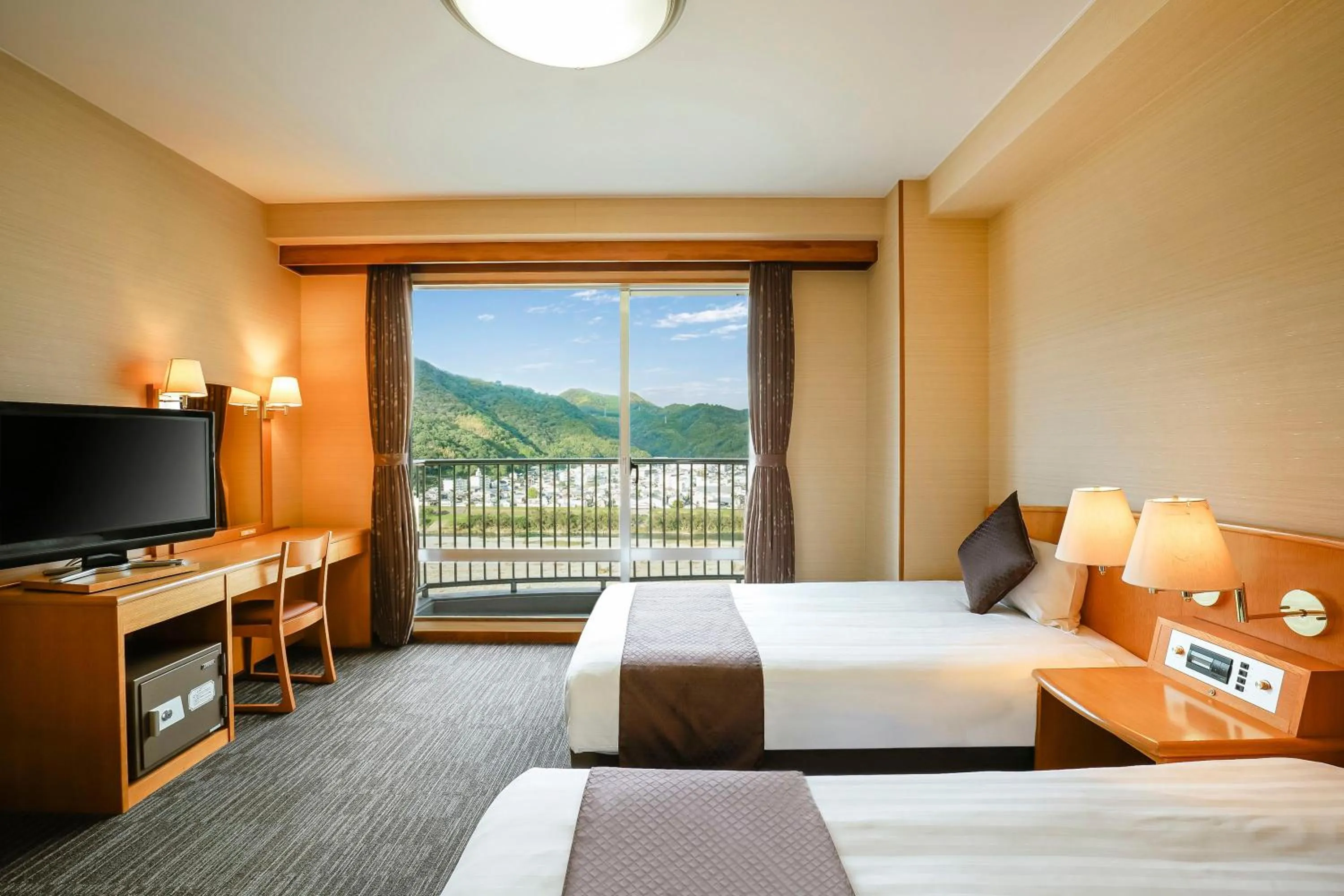 Photo of the whole room, Bed in KAMENOI HOTEL Kochi