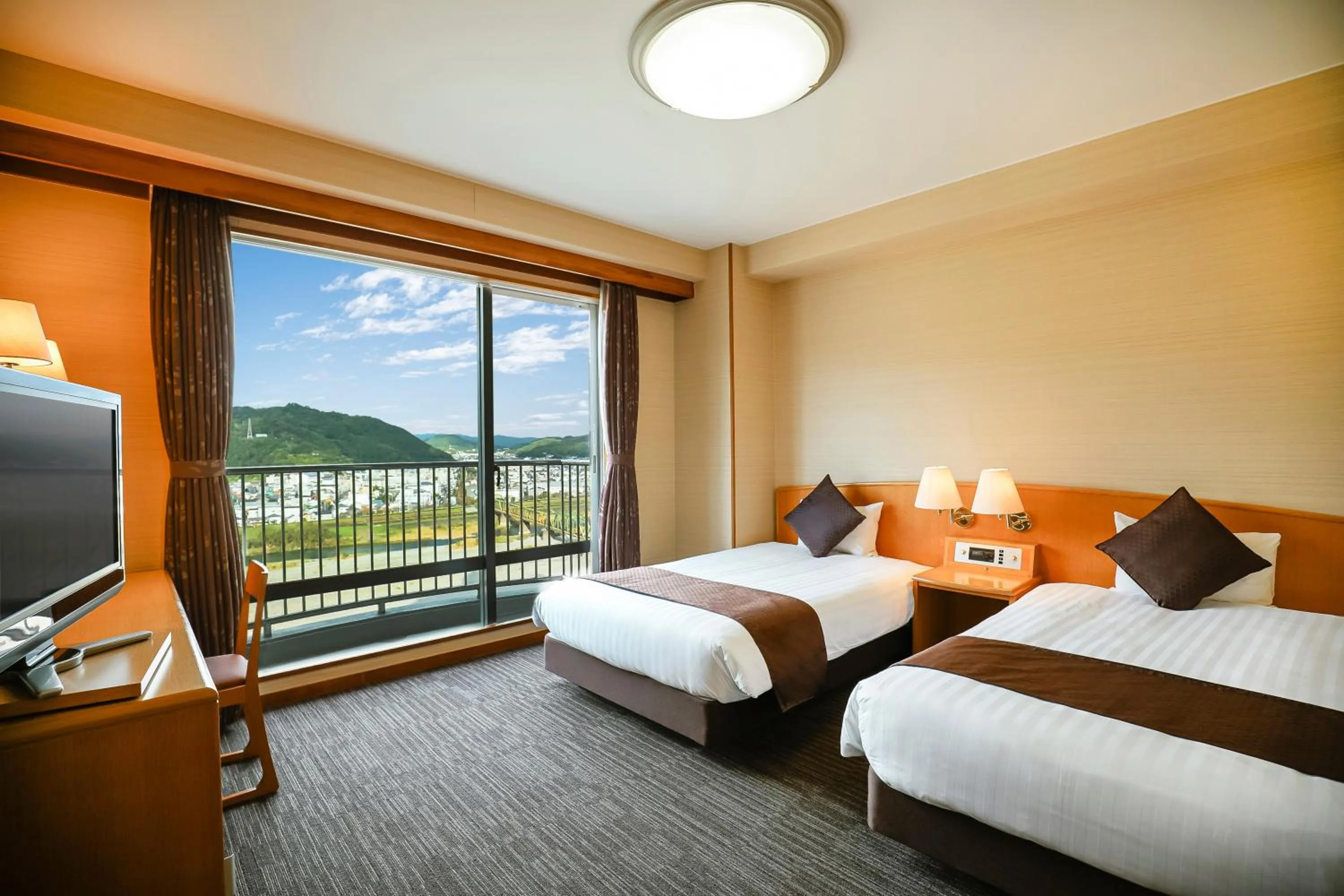 View (from property/room), Bed in KAMENOI HOTEL Kochi