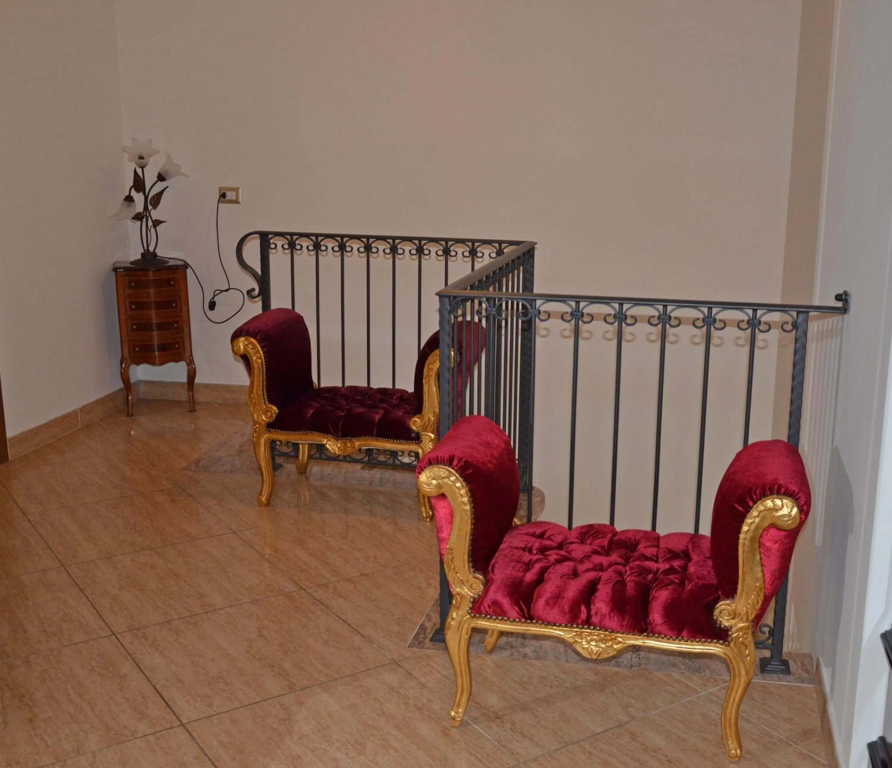 Communal lounge/ TV room in B&B Casa Cavour