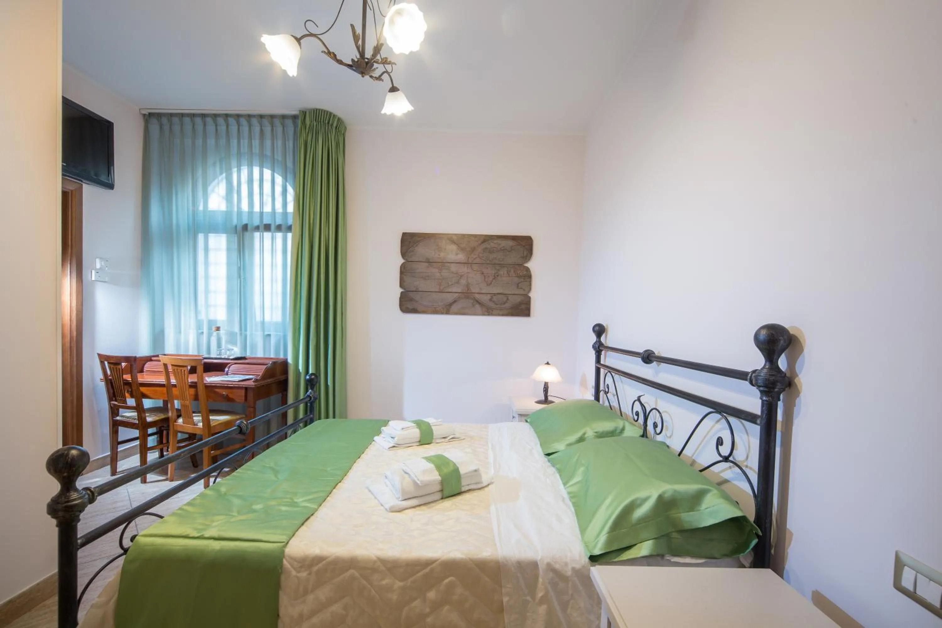 Bed in B&B Casa Cavour