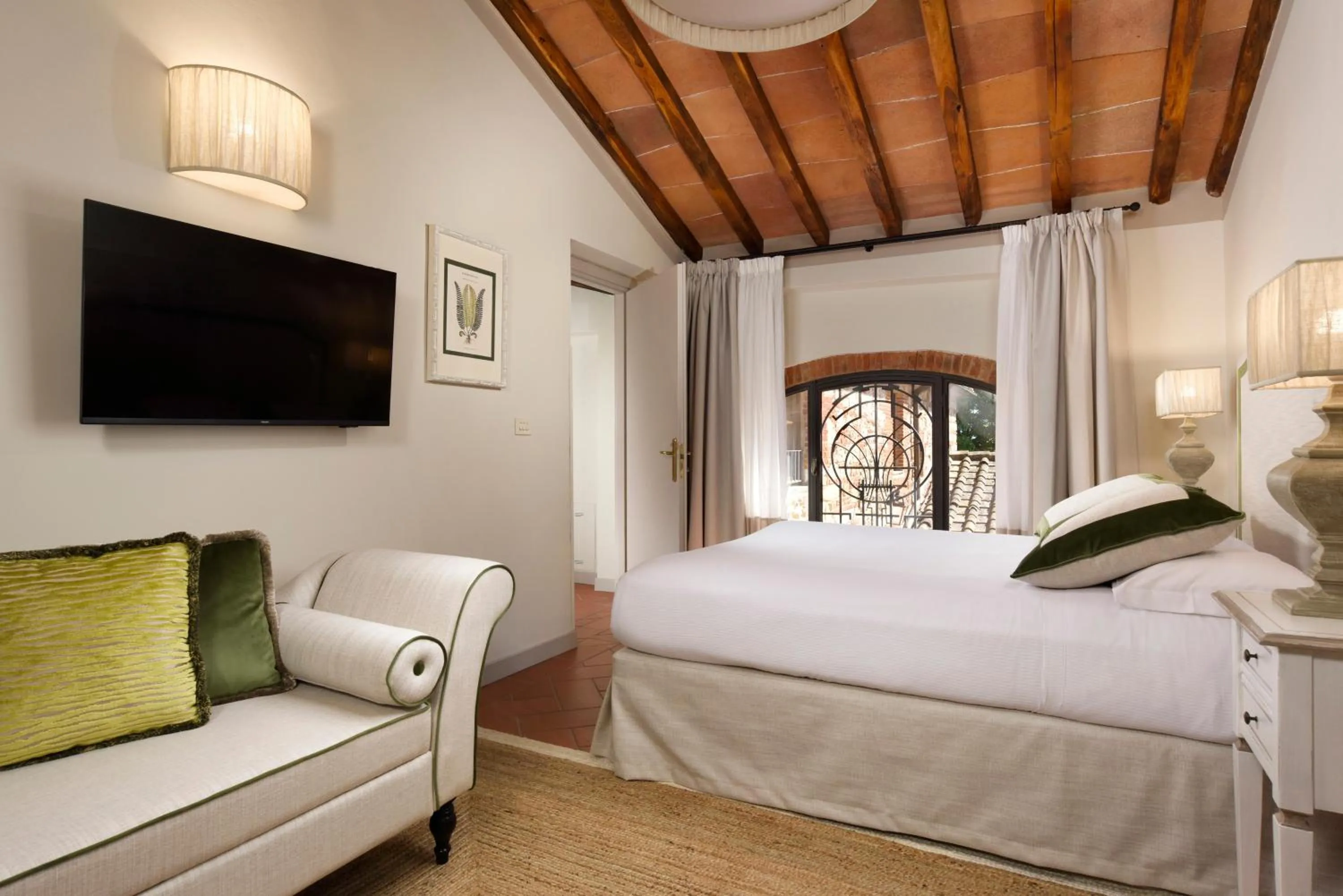 Bed in Borgo Antico Casalbosco Holiday Home & Winery