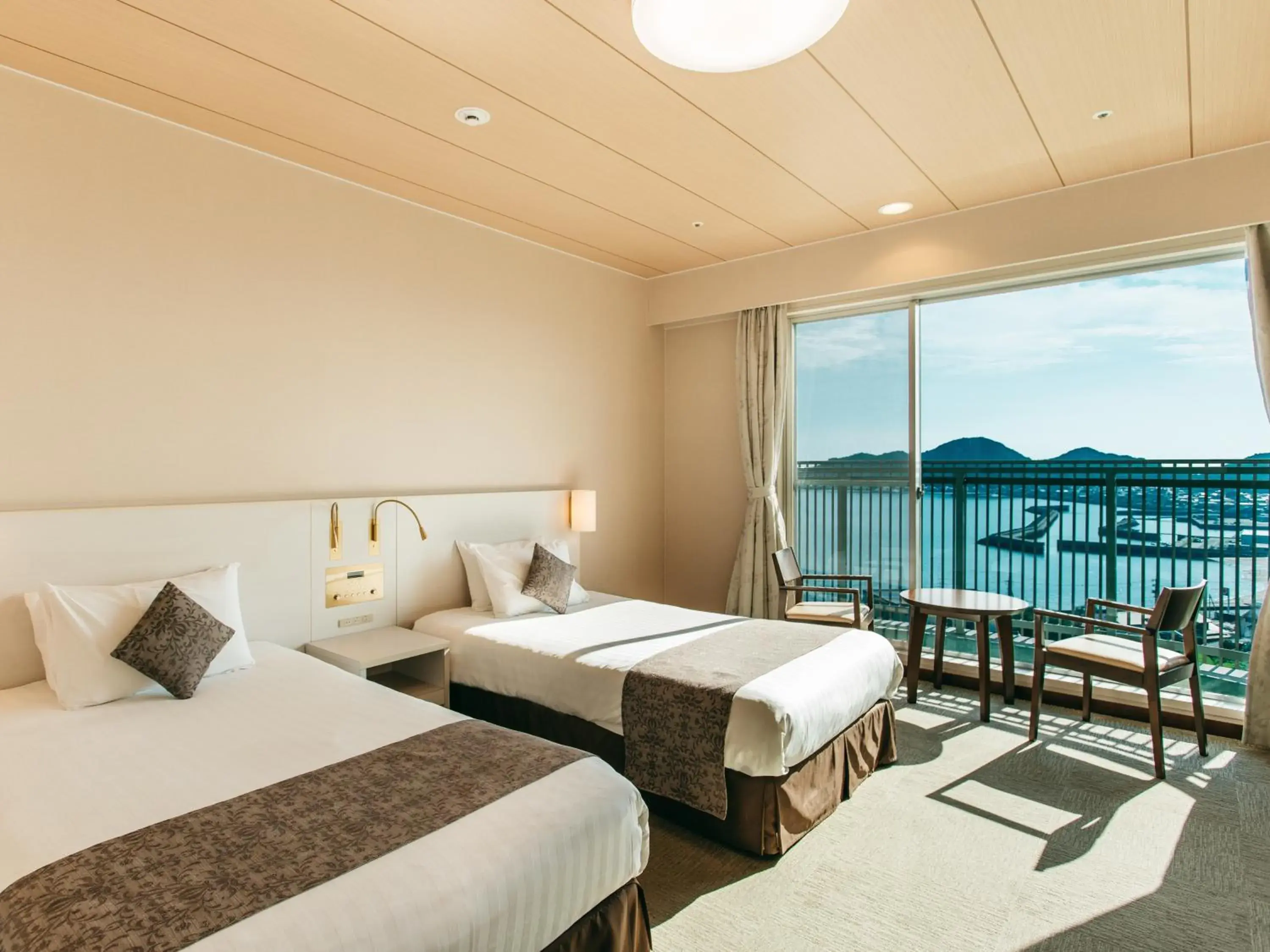 Photo of the whole room, Bed in KAMENOI HOTEL Setouchi Hikari Photo of the whole room, Bed in KAMENOI HOTEL Setouchi Hikari