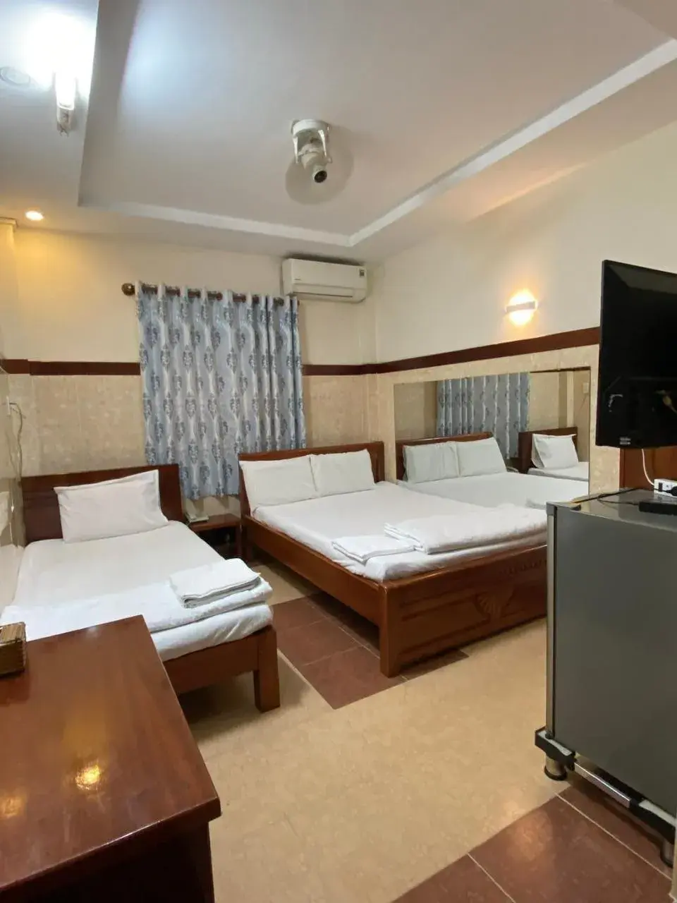 Bed in Thai Dat Hotel Bed in Thai Dat Hotel