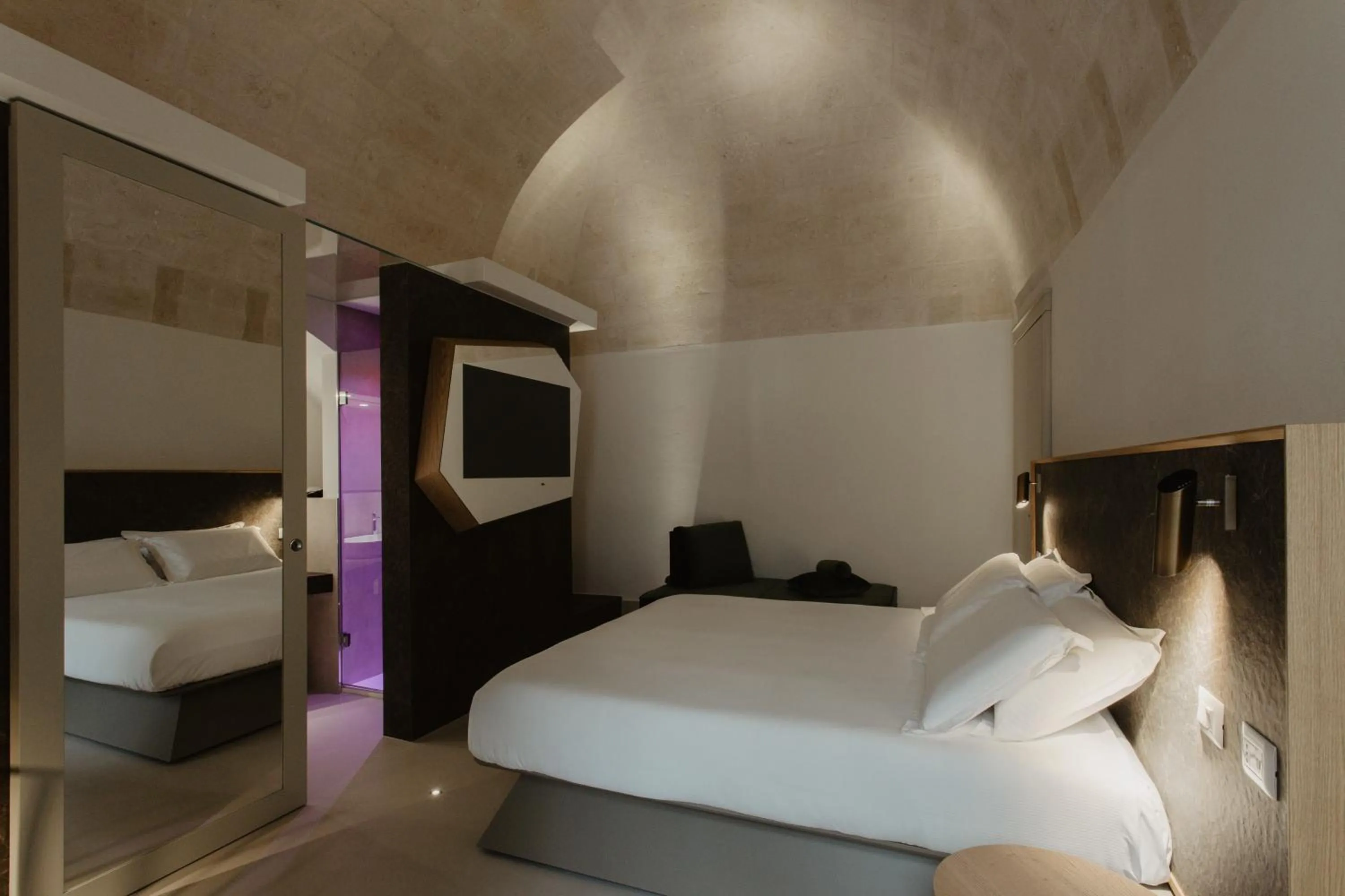 Bed in Euvodia Luxury Rooms