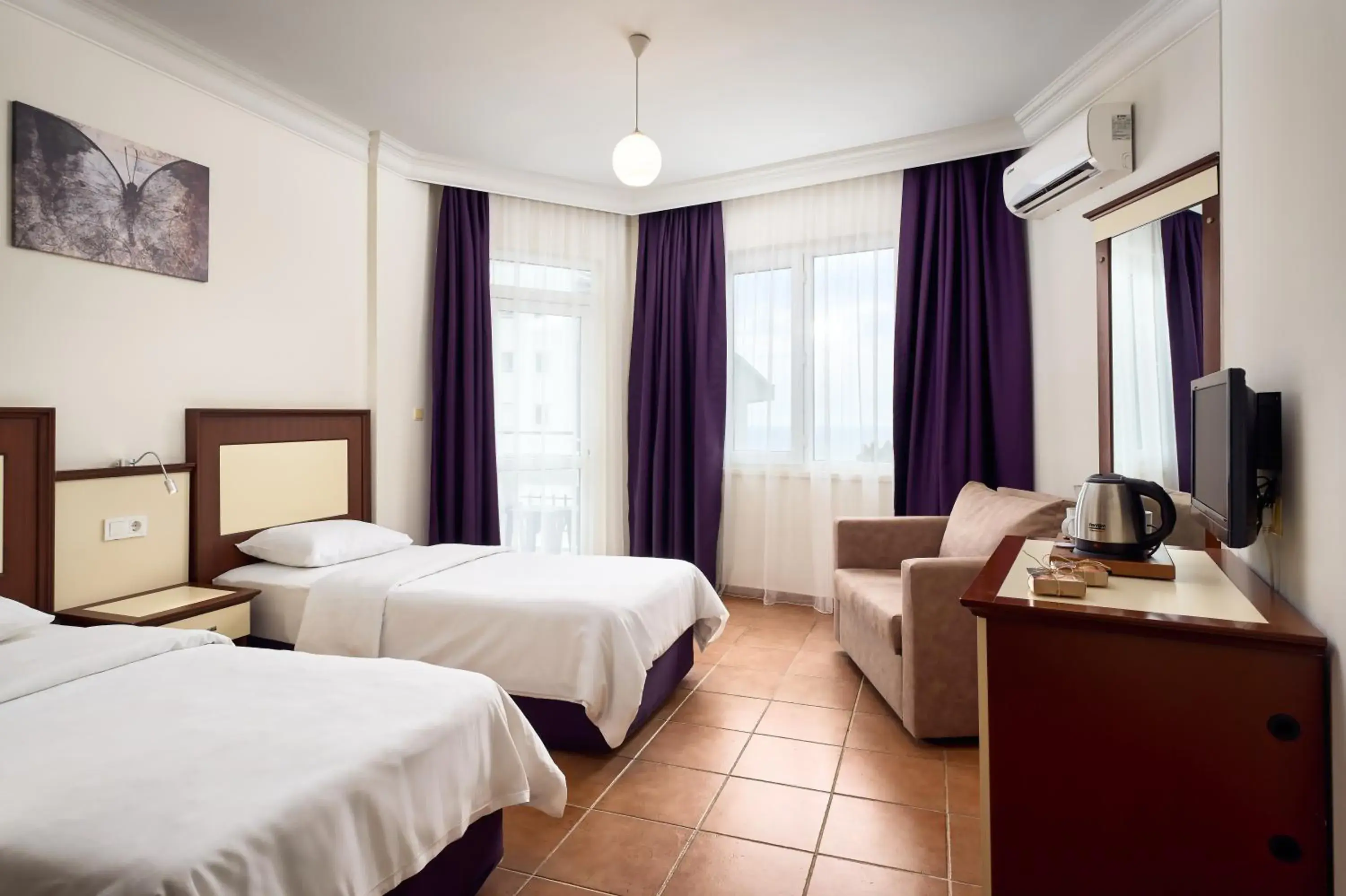 TV and multimedia, Bed in Kaila City Hotel TV and multimedia, Bed in Kaila City Hotel