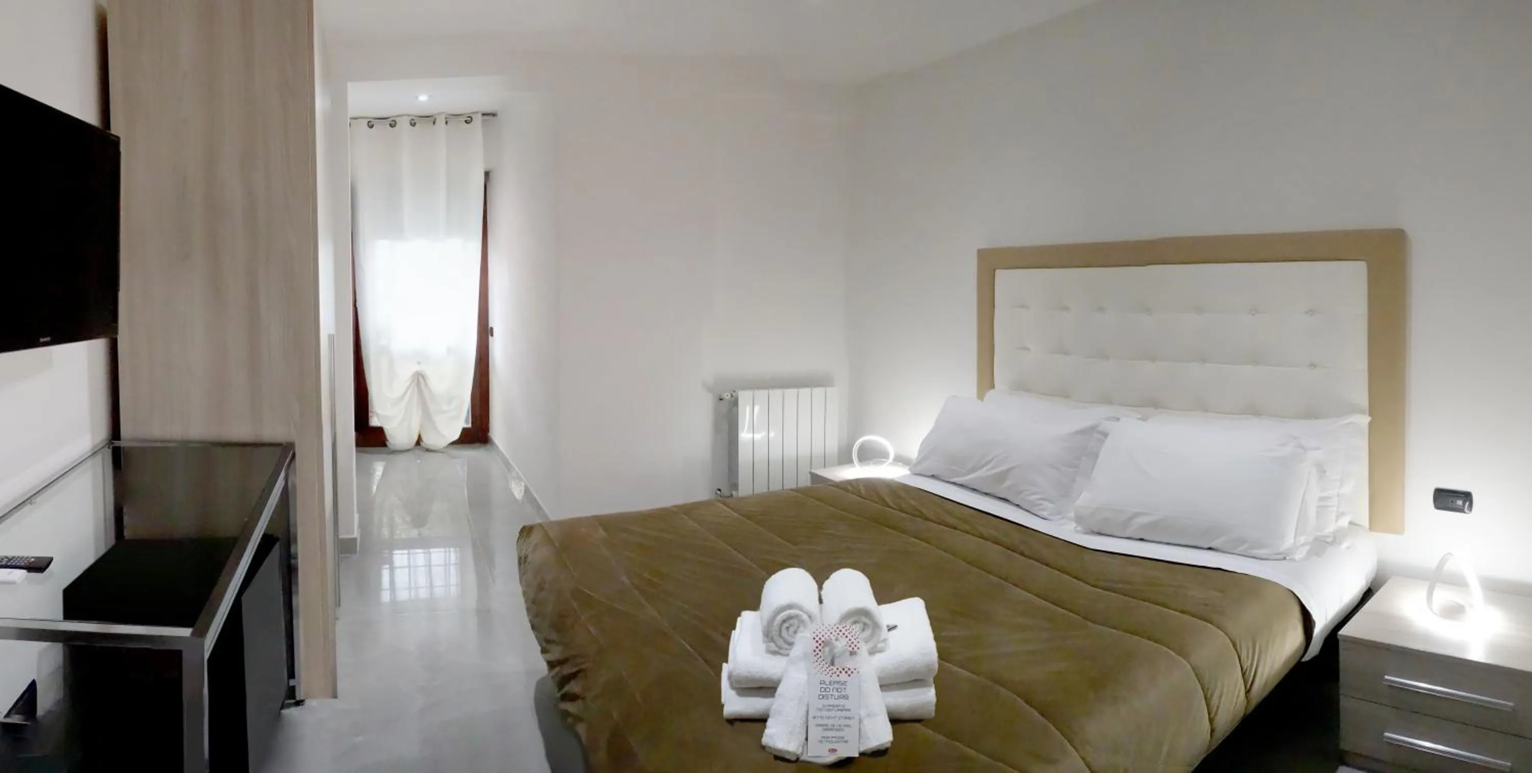 Bed in La Fiera GuestHouse