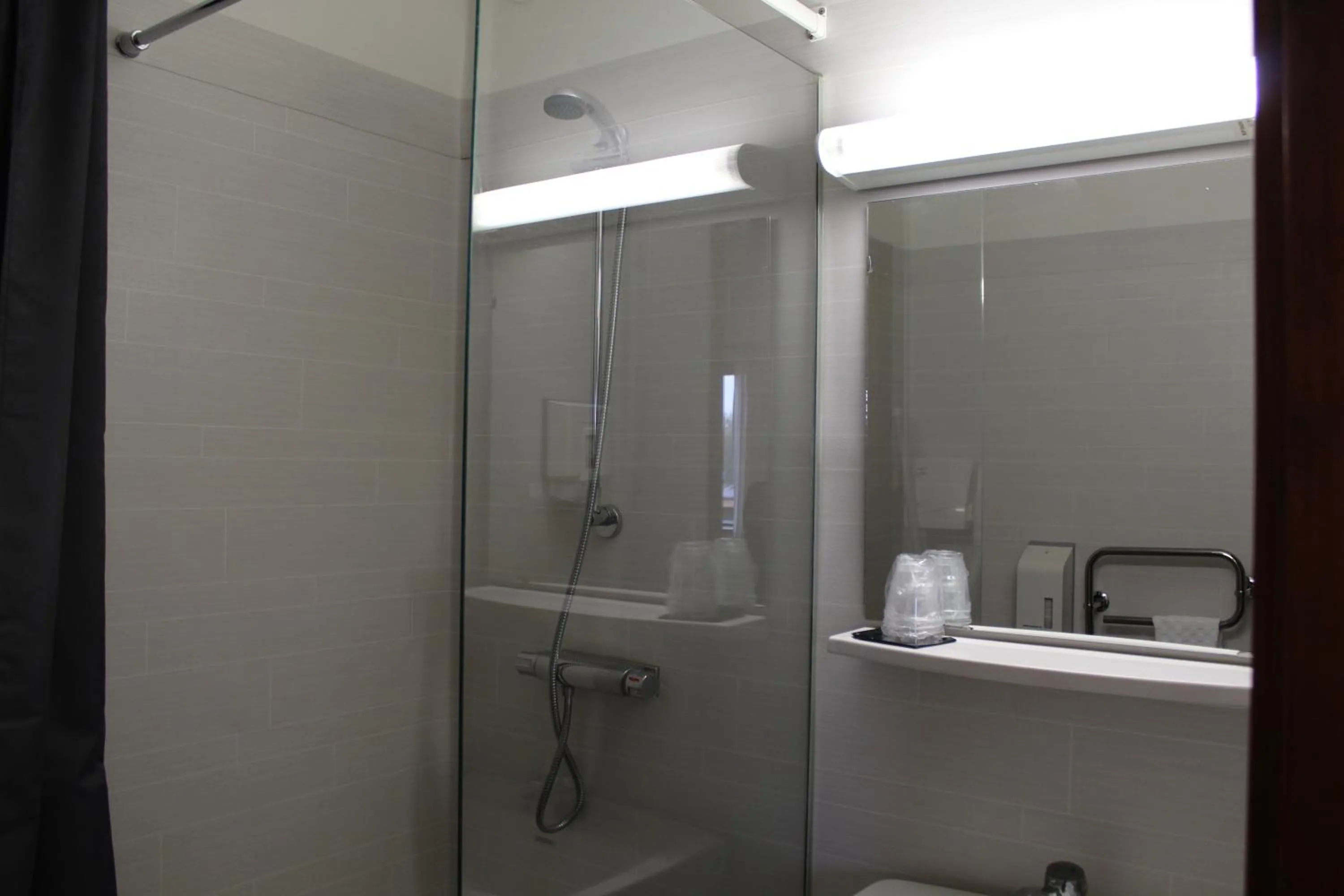 Shower in Hotell Amigo