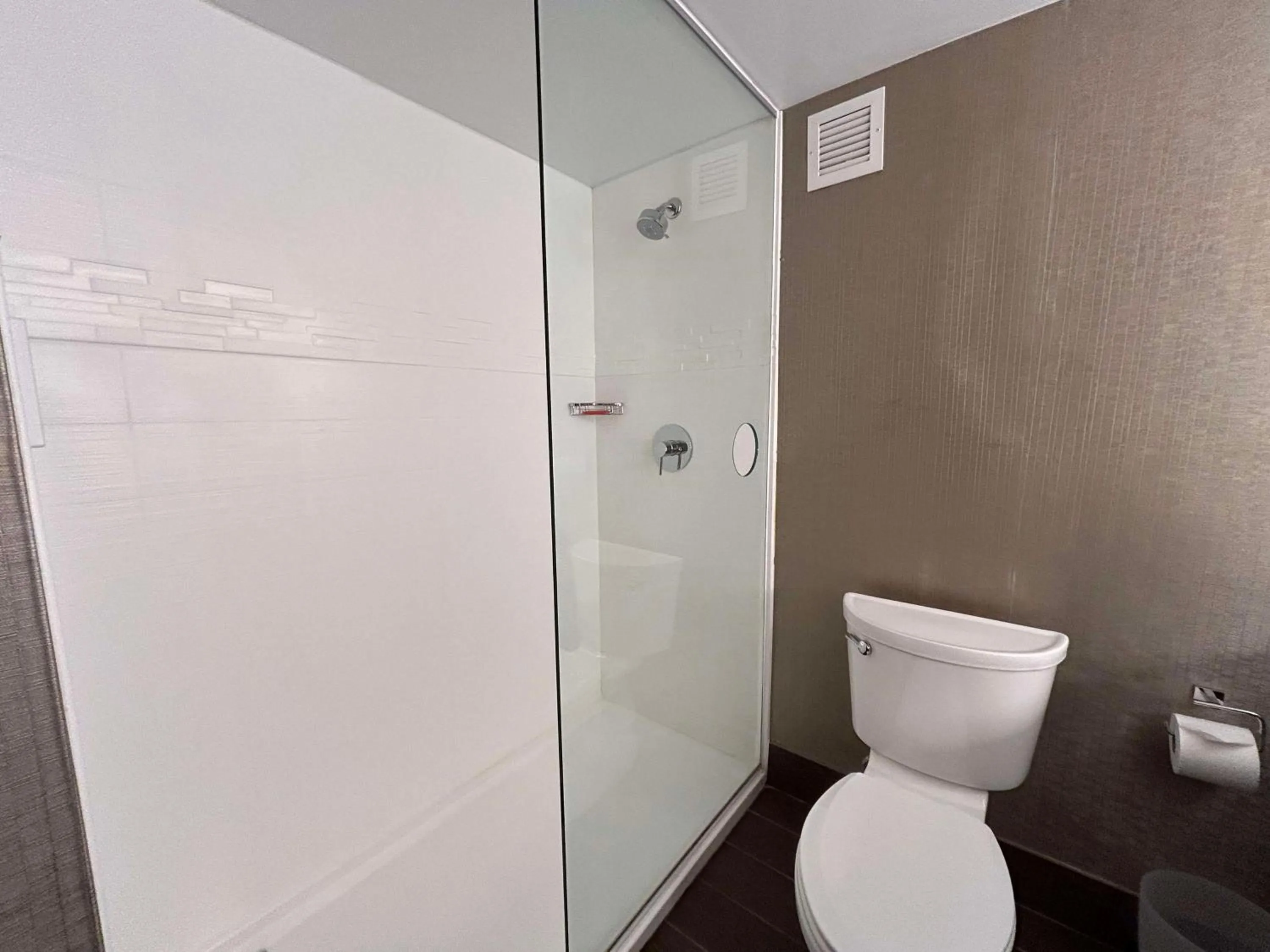 Bathroom in Skyline Hotel Detroit Airport, SureStay Collection by Best Western
