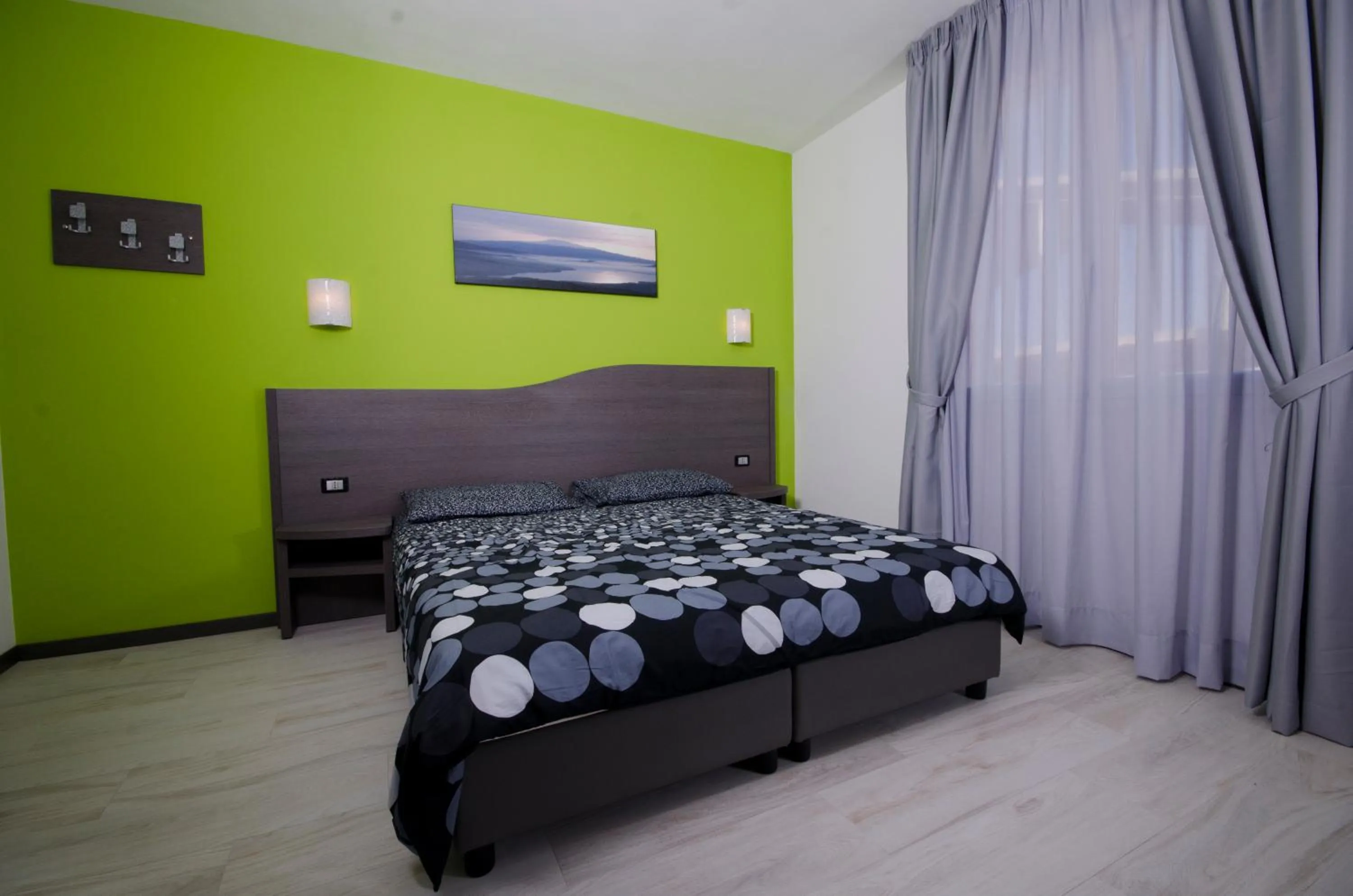 Bedroom, Bed in Hotel Rainbow Resort