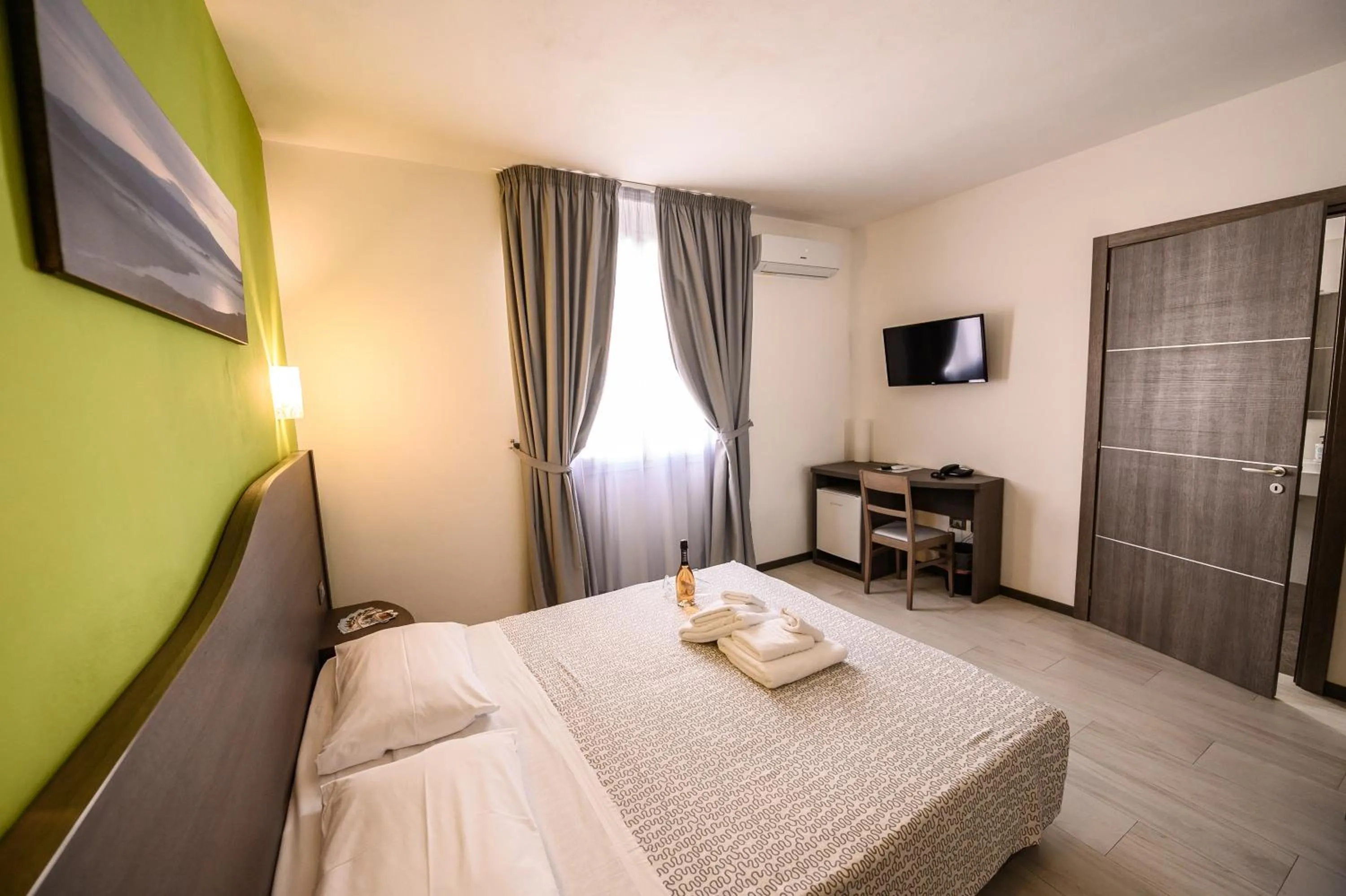 Bed in Hotel Rainbow Resort