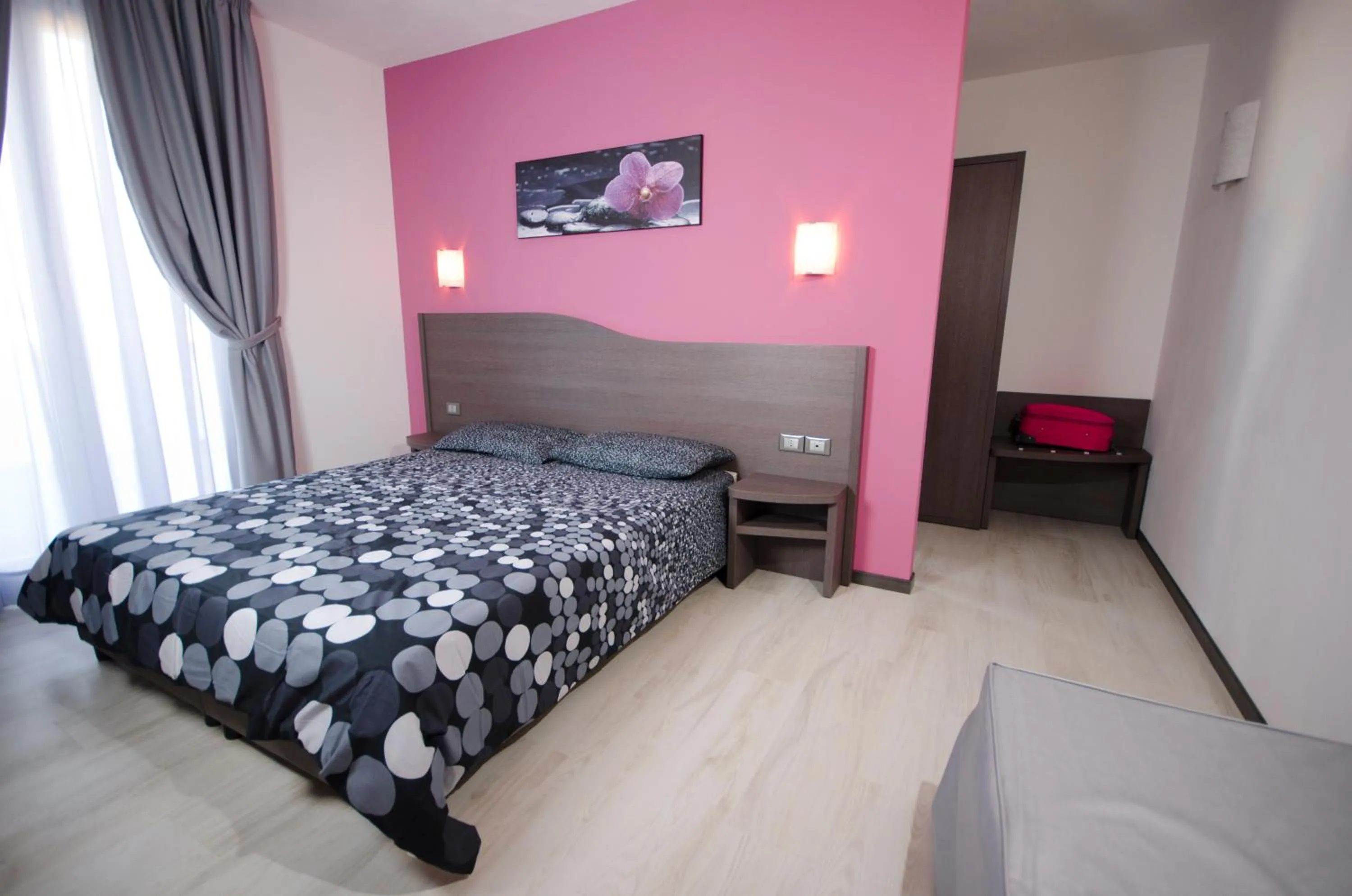 Bed in Hotel Rainbow Resort