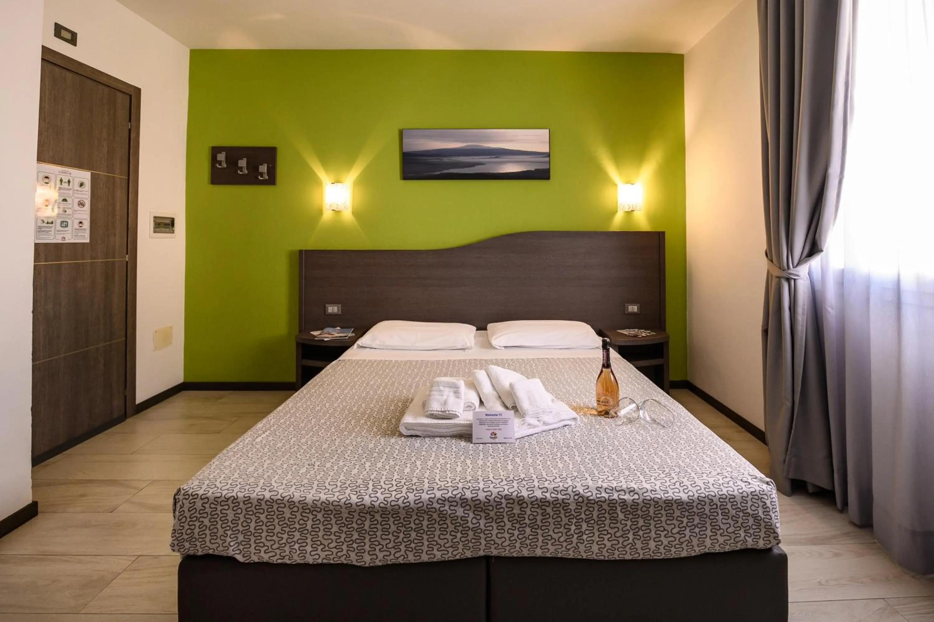 Bed in Hotel Rainbow Resort