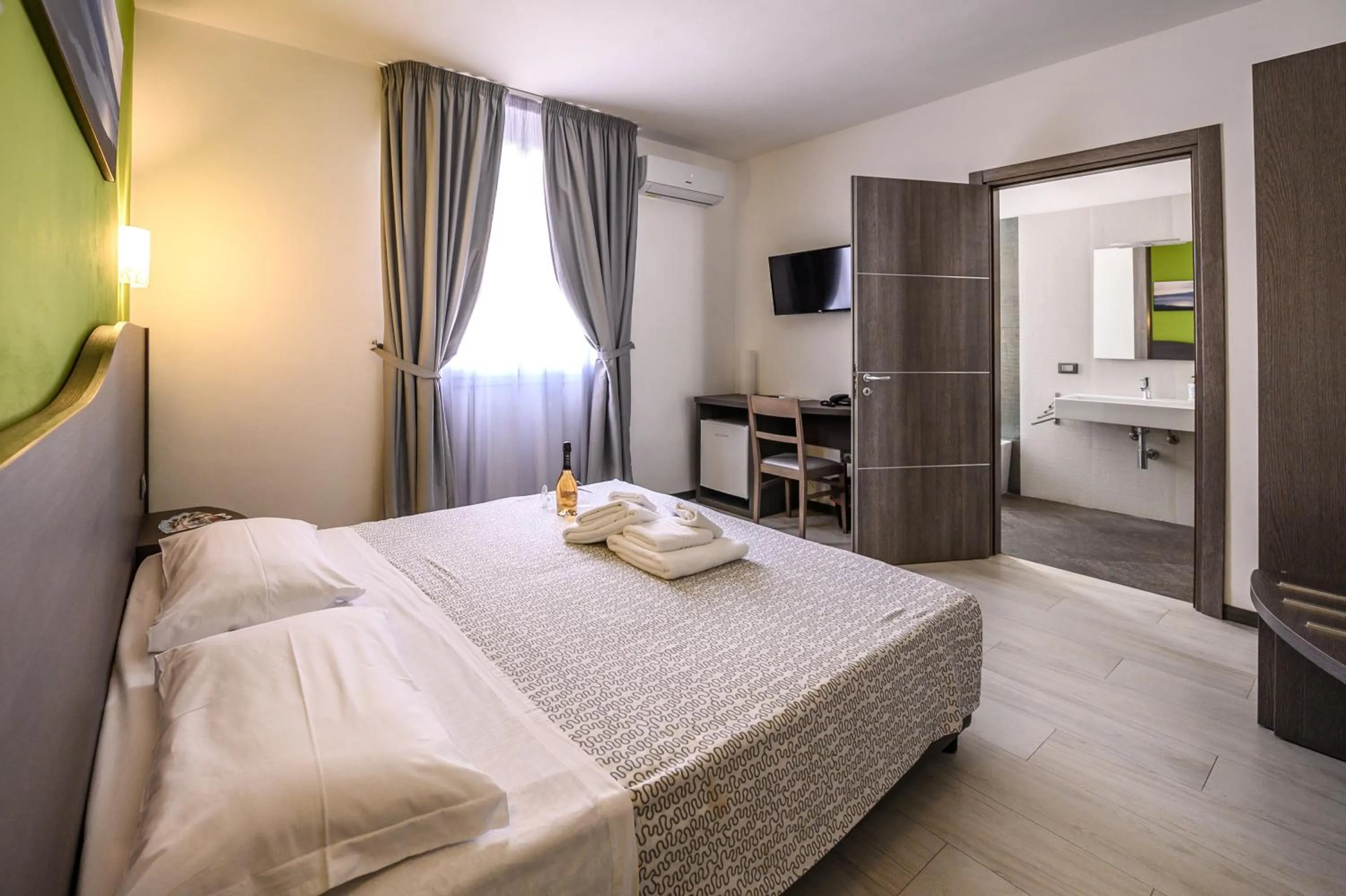 Bed in Hotel Rainbow Resort