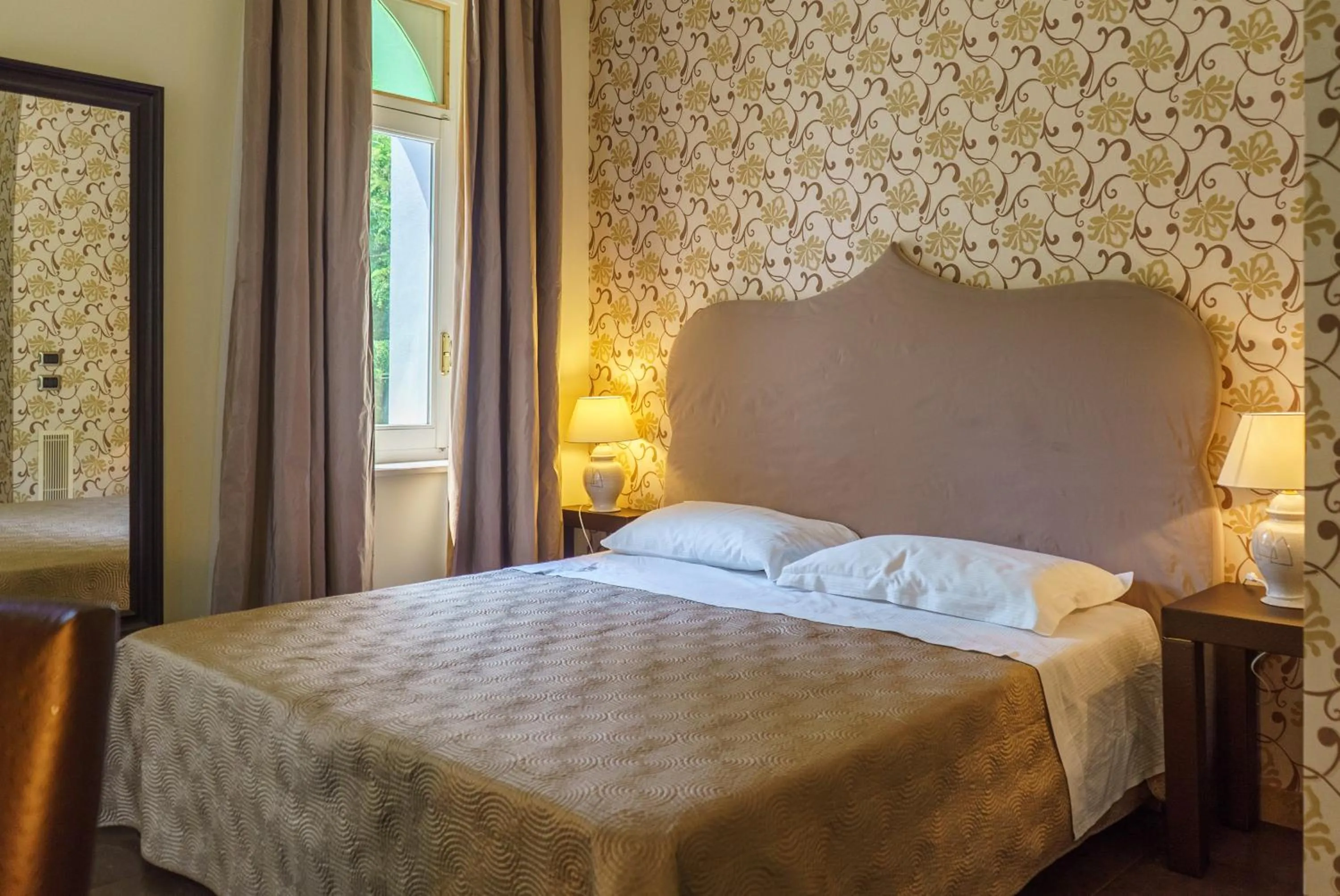 Bed in Relais La Placa