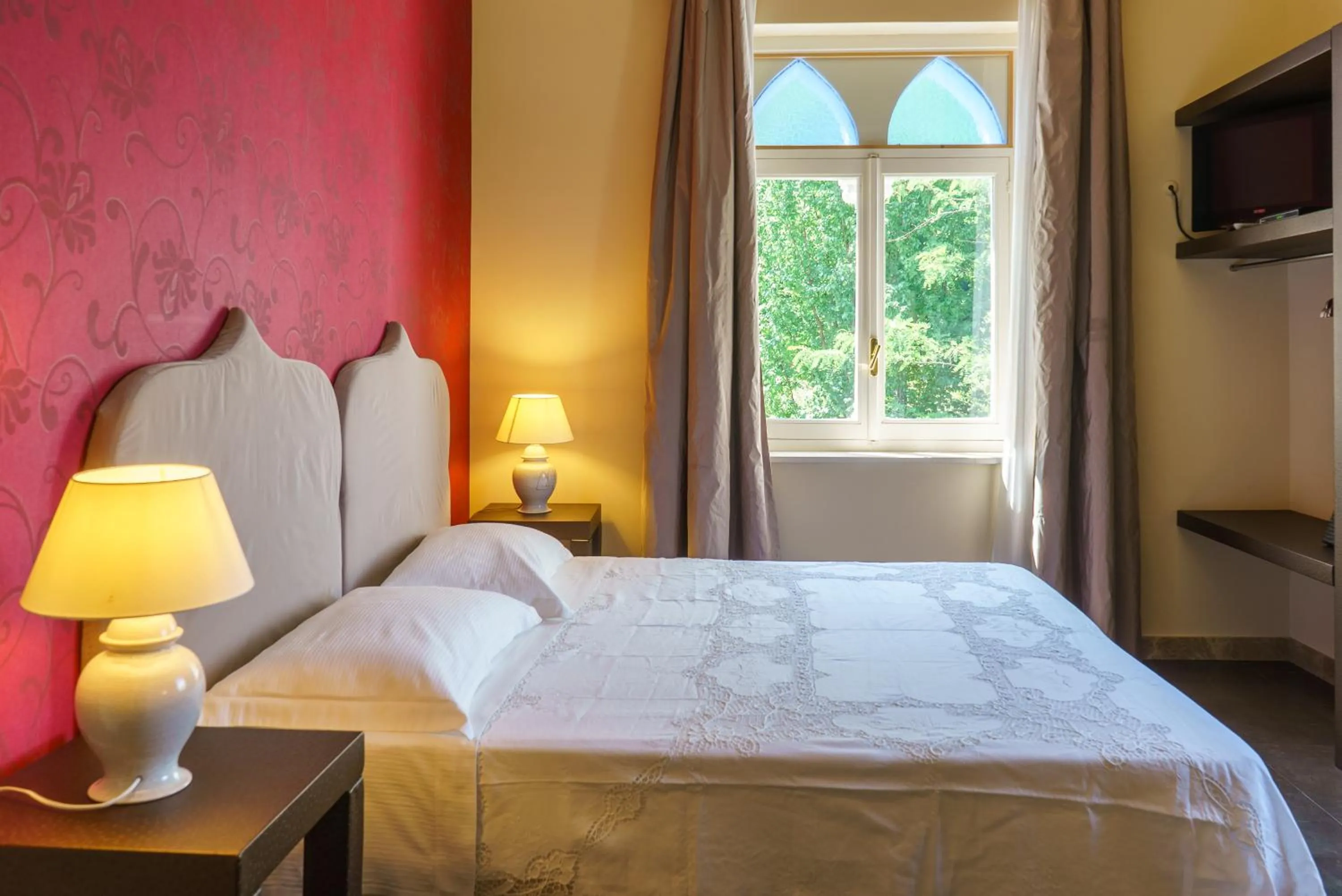 Bed in Relais La Placa