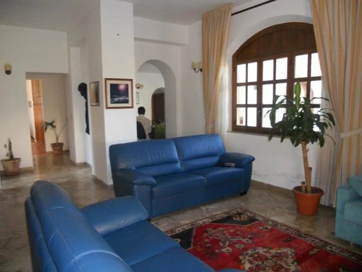 Communal lounge/ TV room in Residence Gnura Momma