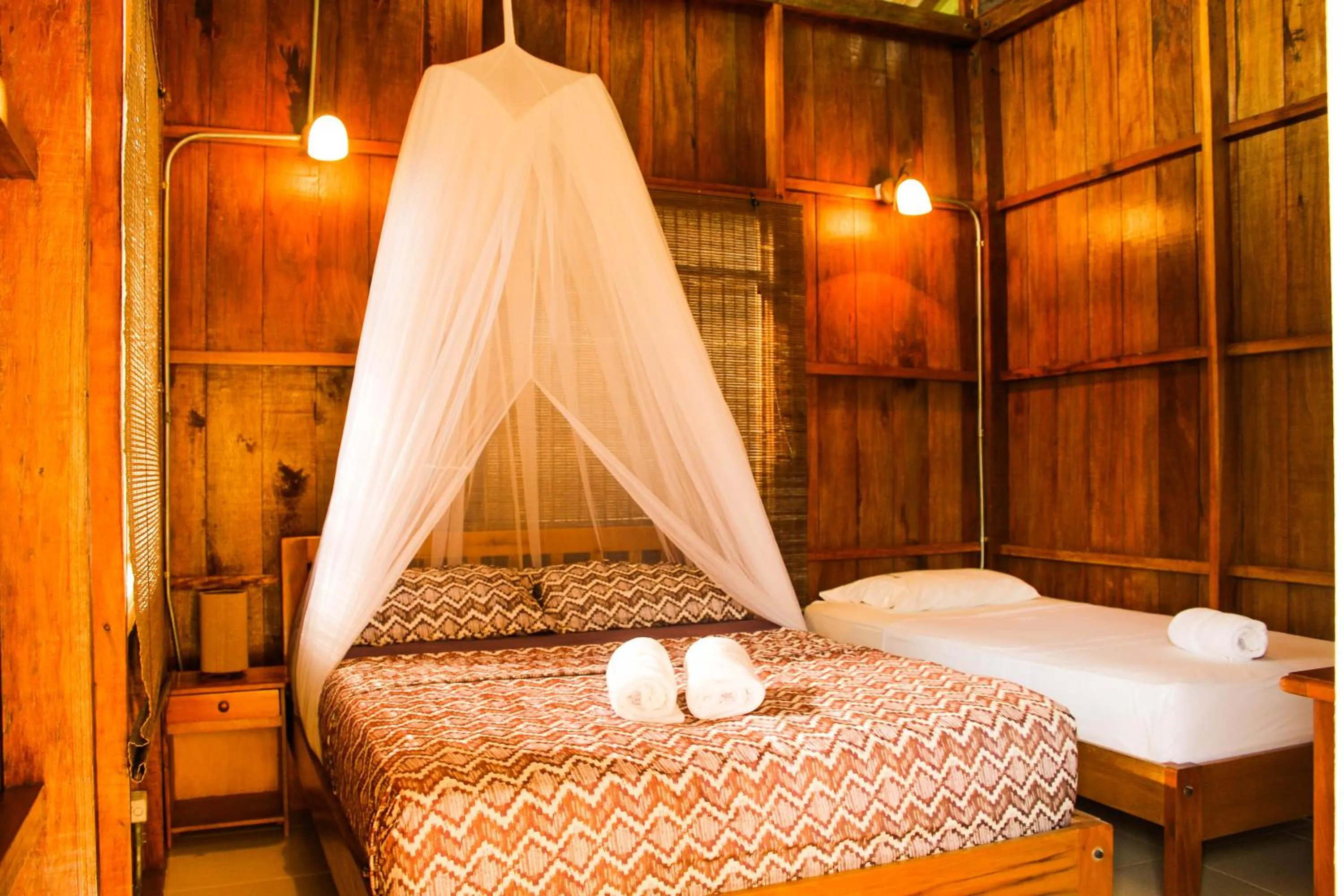 Photo of the whole room, Bed in Hotel Utüane