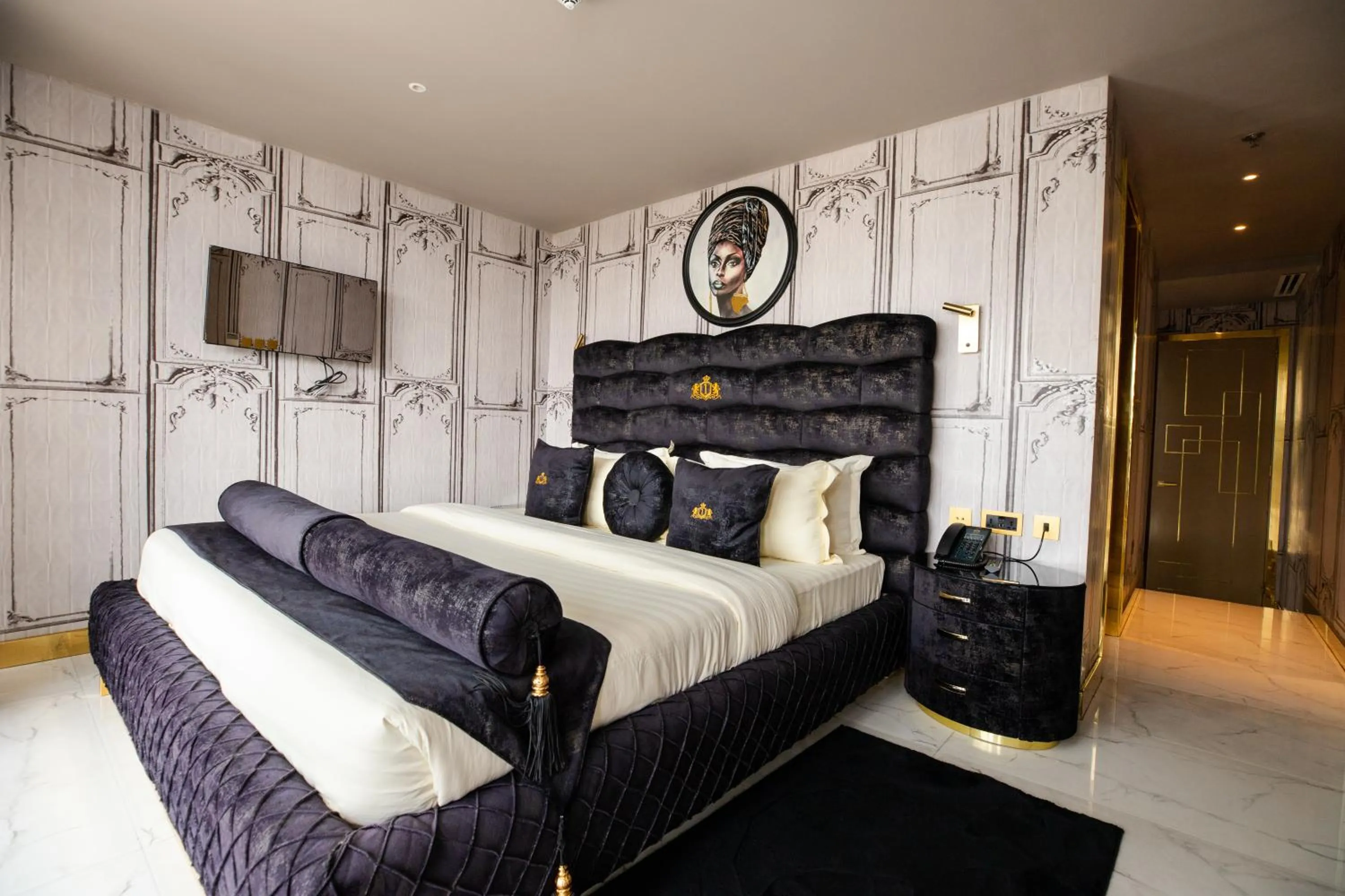 Bed in Number One Oxford Street Hotel & Suites