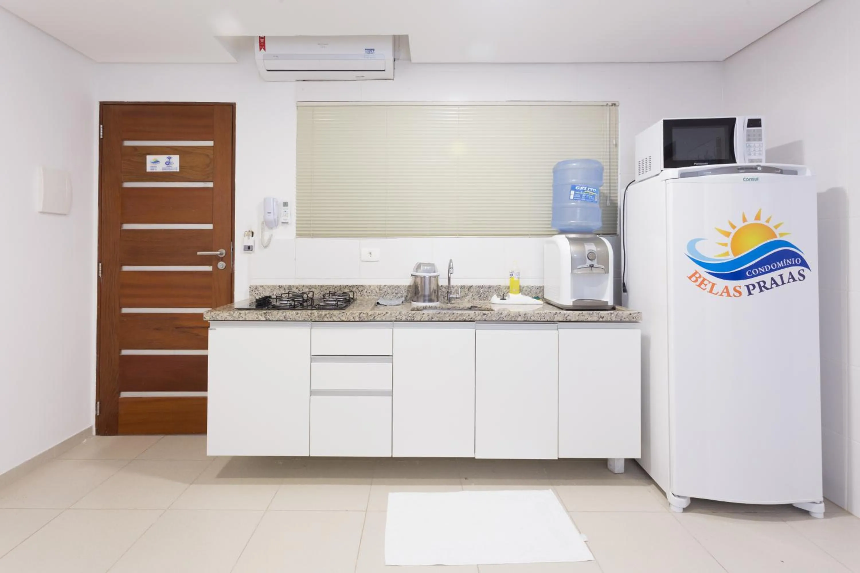 Kitchen or kitchenette in Condomínio Belas Praias