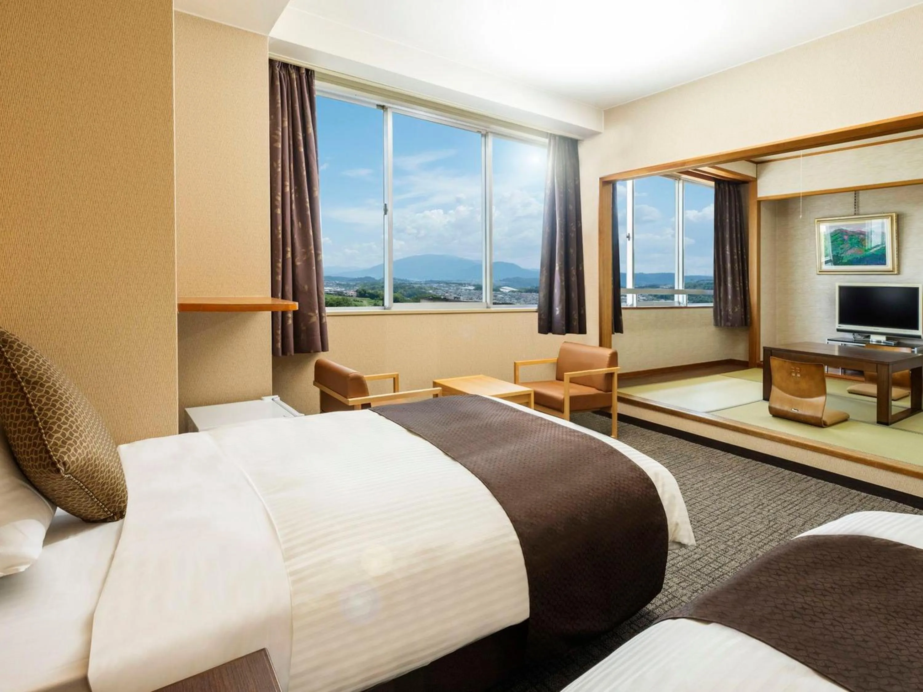 Photo of the whole room, Bed in KAMENOI HOTEL Yamato Heguri