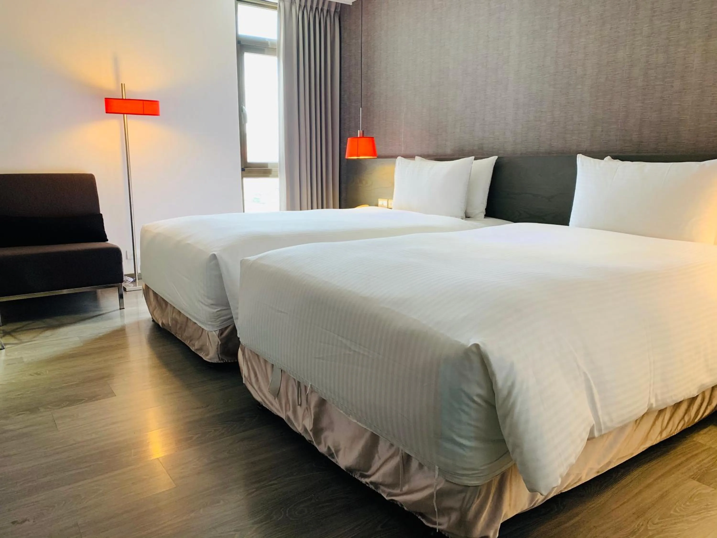 Bed in Ramada Encore By Wyndham Hualien