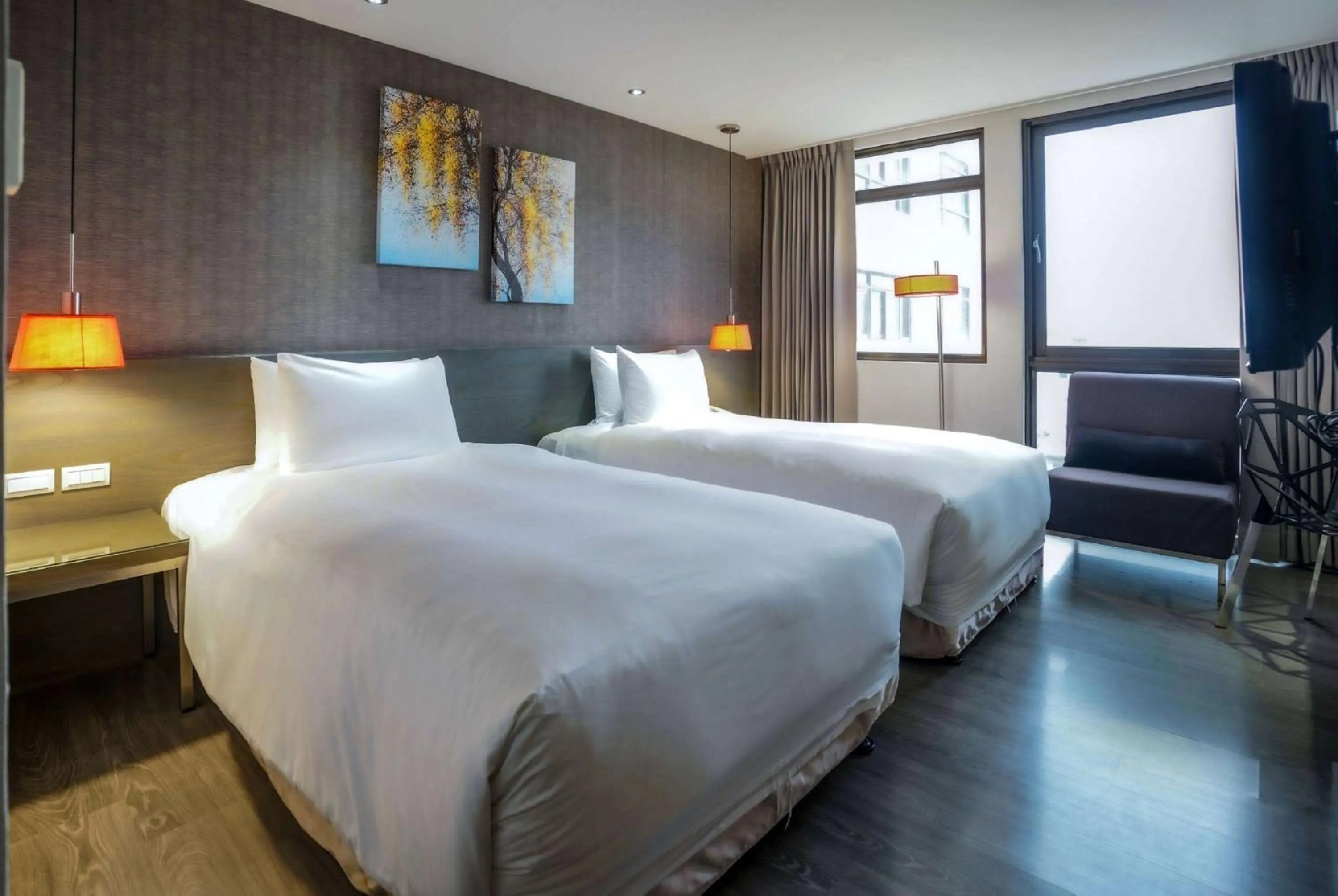 Photo of the whole room, Bed in Ramada Encore By Wyndham Hualien