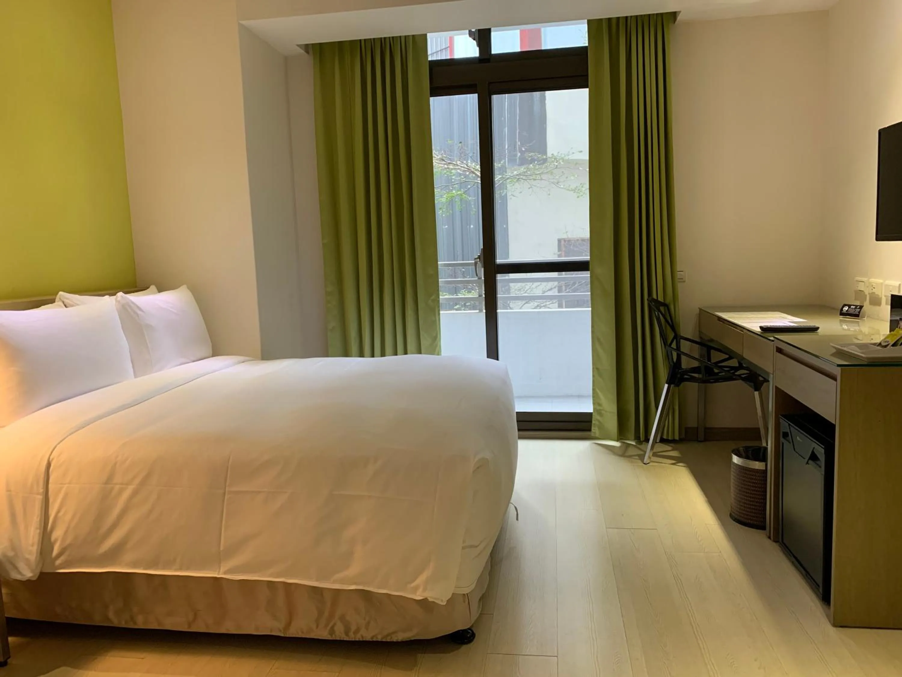 Photo of the whole room, Bed in Ramada Encore By Wyndham Hualien