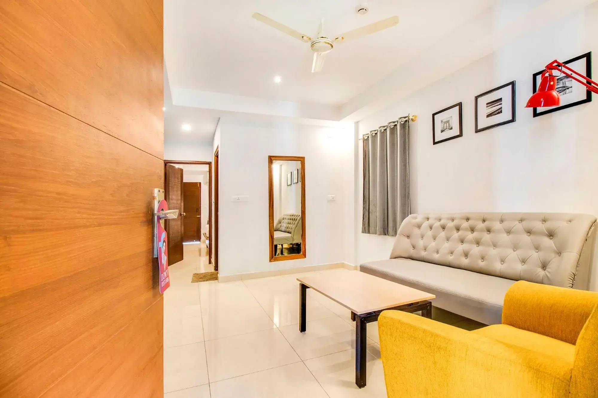 Living room in FabHotel The Sun Suites - Yelahanka Living room in FabHotel The Sun Suites - Yelahanka