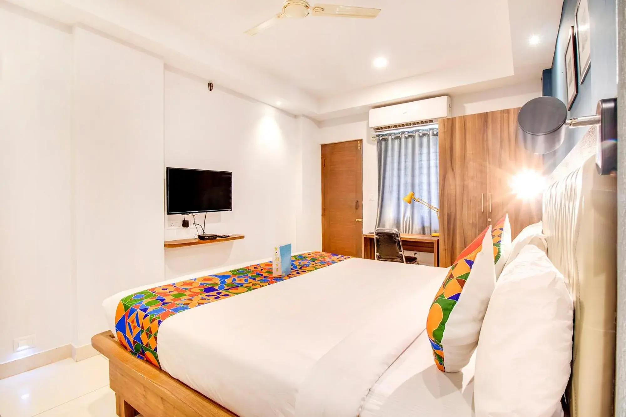 TV and multimedia, Bed in FabHotel The Sun Suites - Yelahanka TV and multimedia, Bed in FabHotel The Sun Suites - Yelahanka