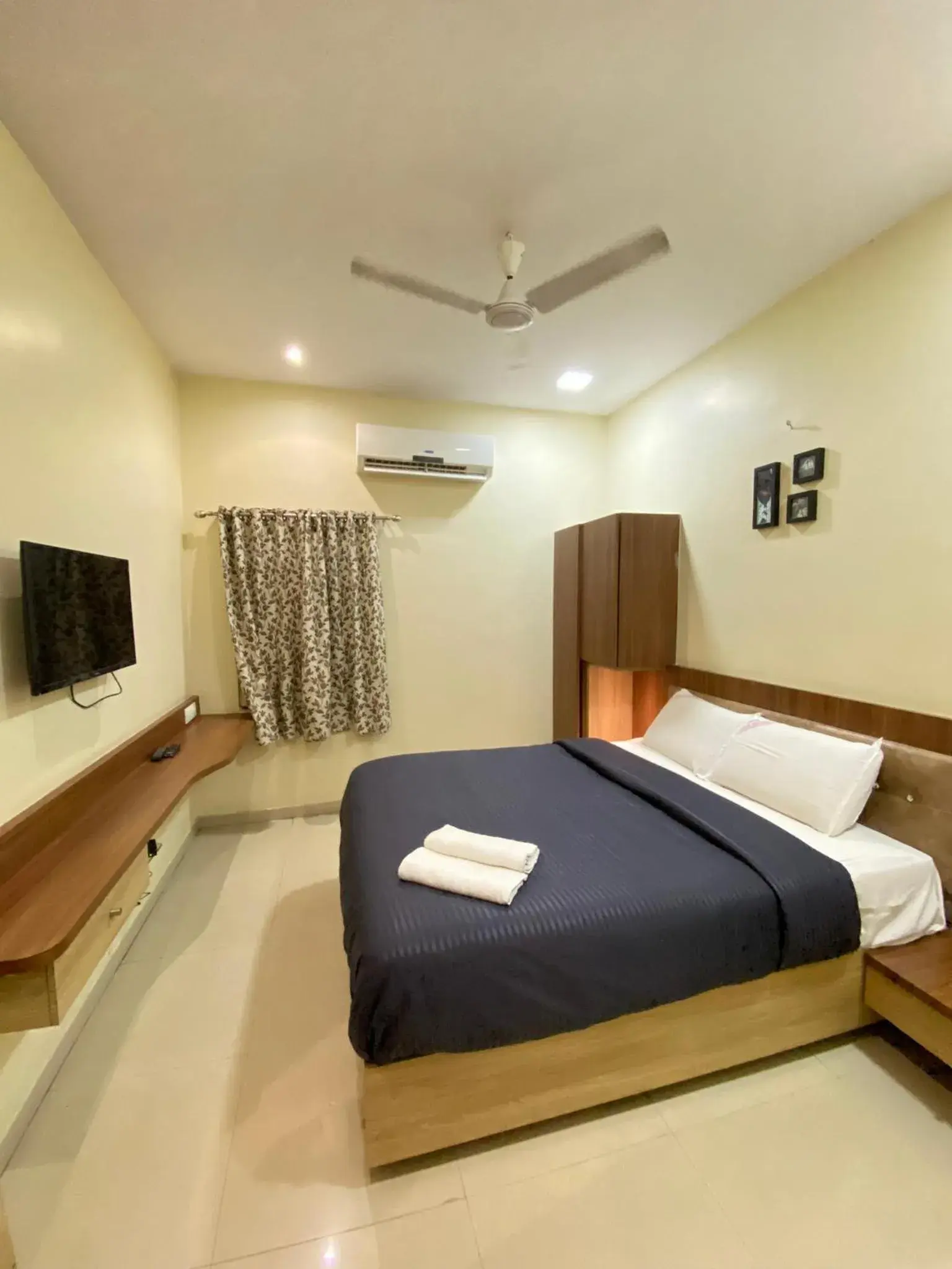 Communal lounge/ TV room, Bed in Hotel Lakshmi Residency Communal lounge/ TV room, Bed in Hotel Lakshmi Residency