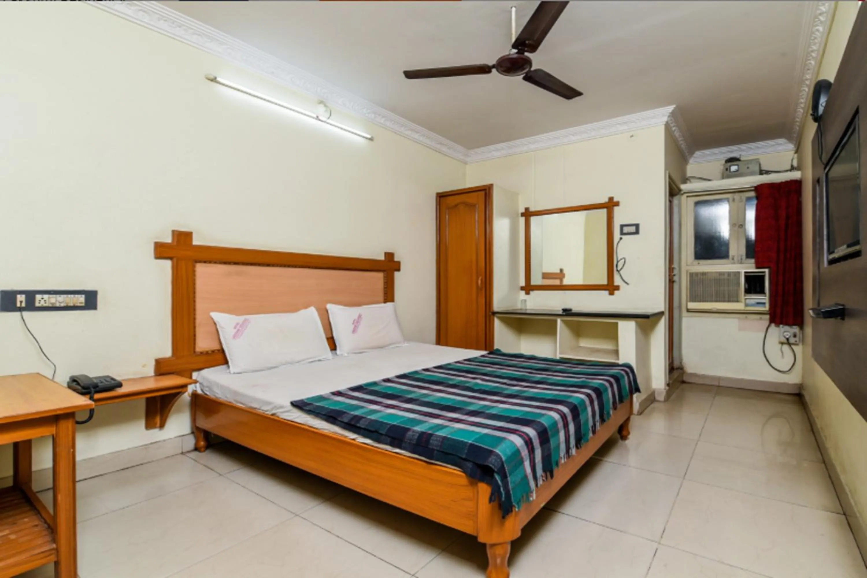 Bed in Hotel Lakshmi Residency