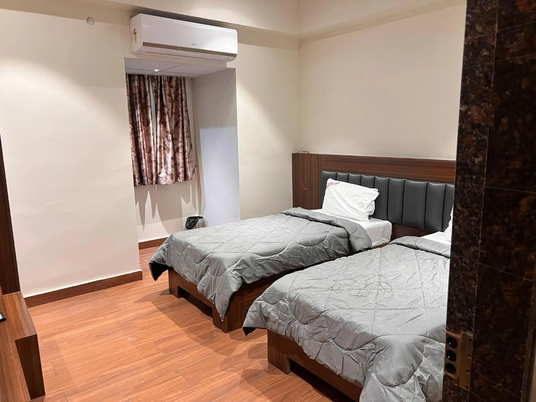 Bed in Hotel Lakshmi Residency