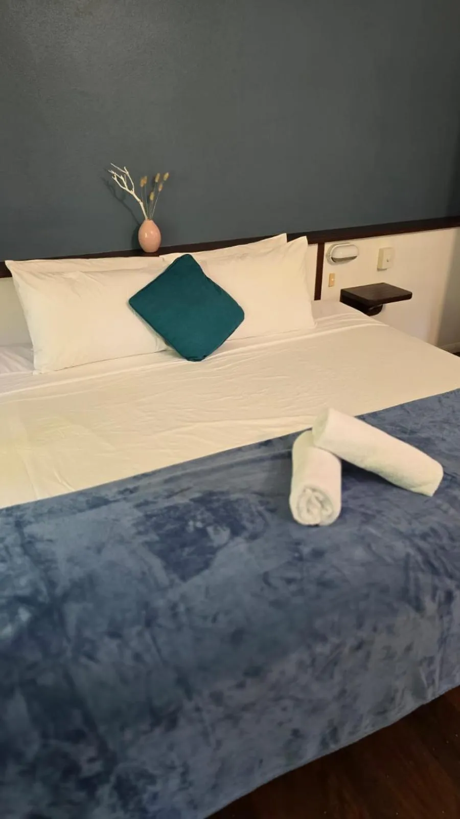 Bed in Ferntree Rainforest Lodge