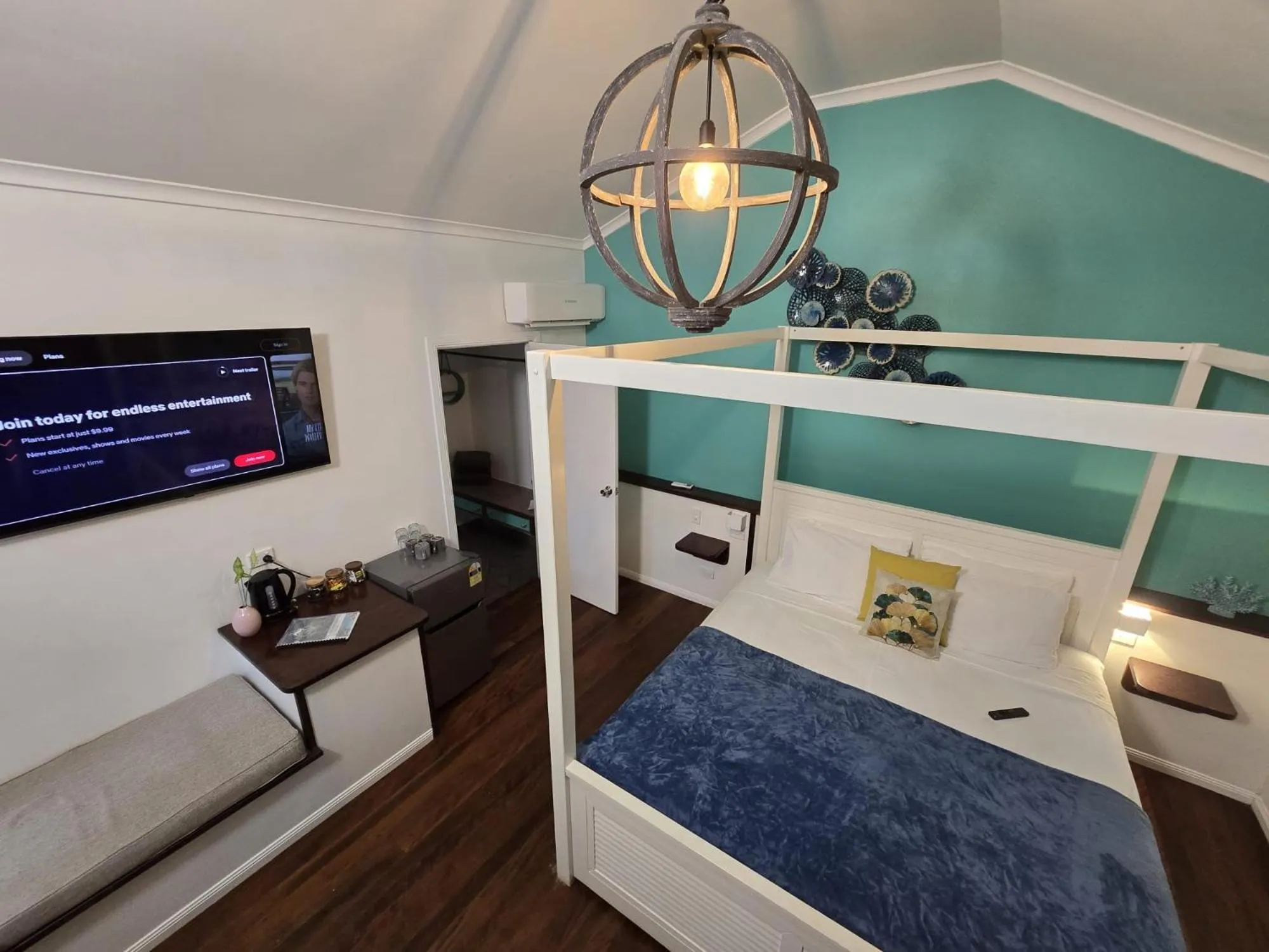 Bed in Ferntree Rainforest Lodge