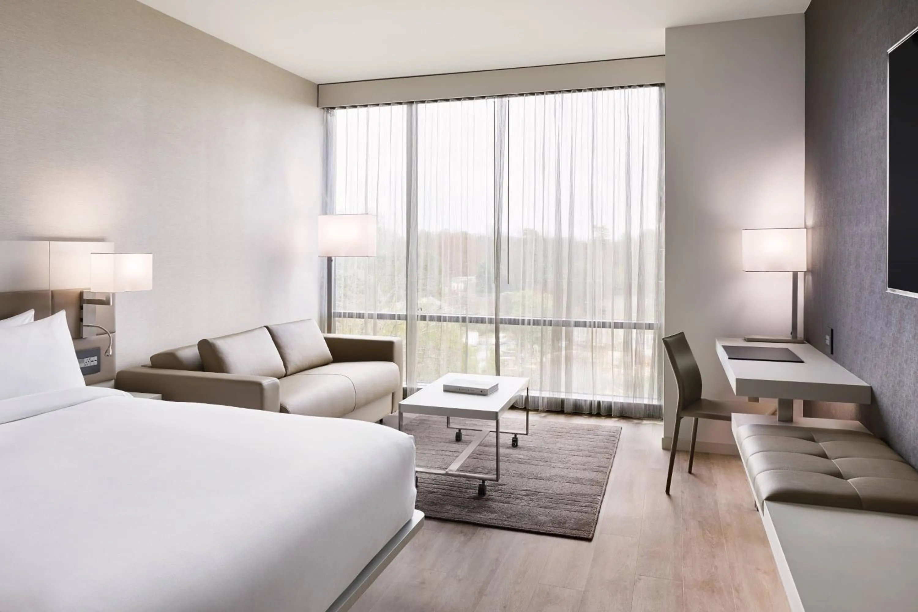 Photo of the whole room, Bed in AC Hotel by Marriott Charlotte SouthPark