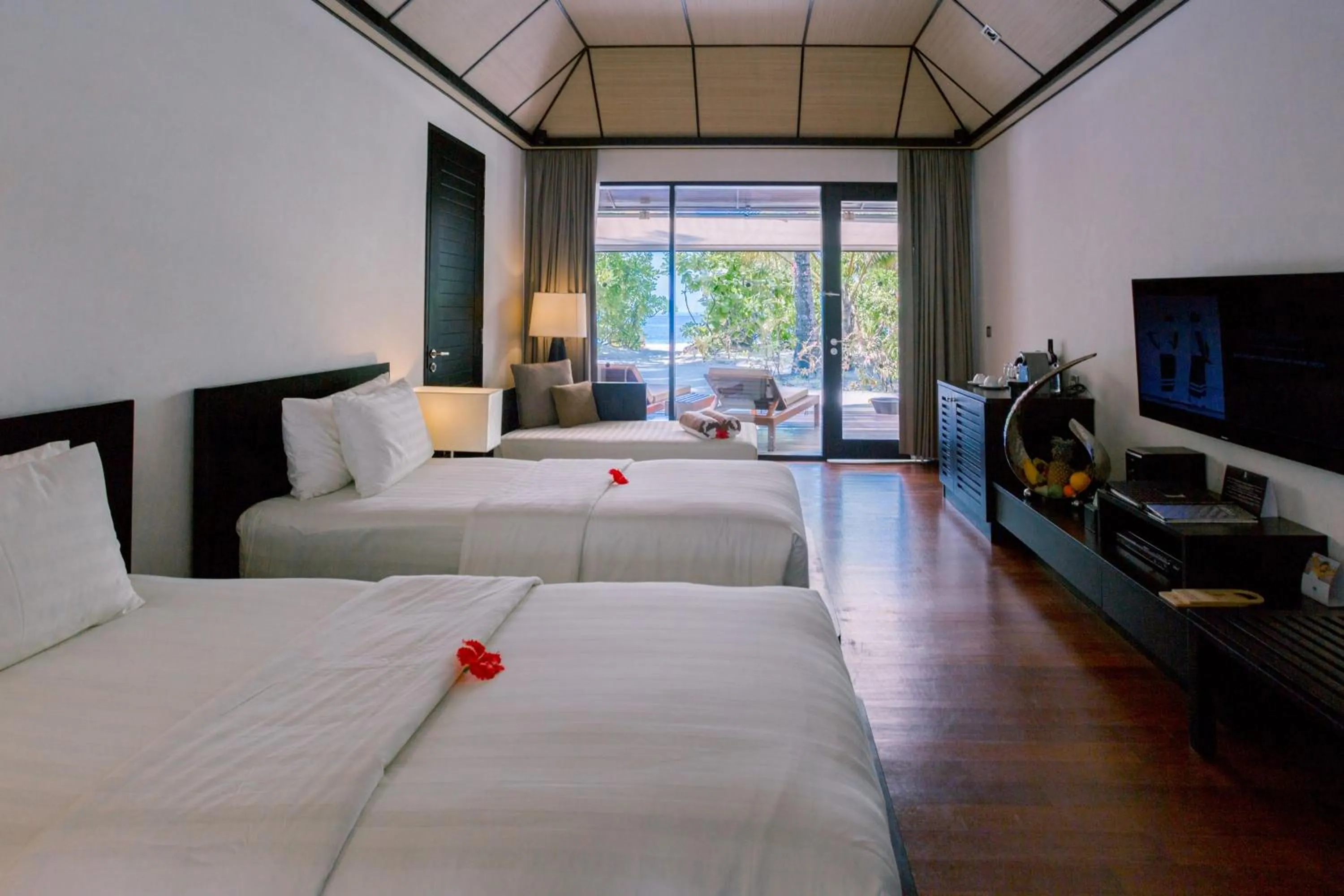 Bedroom, Bed in Lily Beach Resort and Spa - All Inclusive