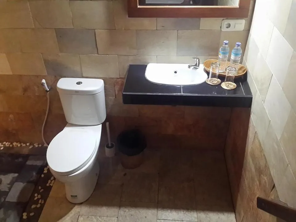 Toilet in Turtle Garden Hotel