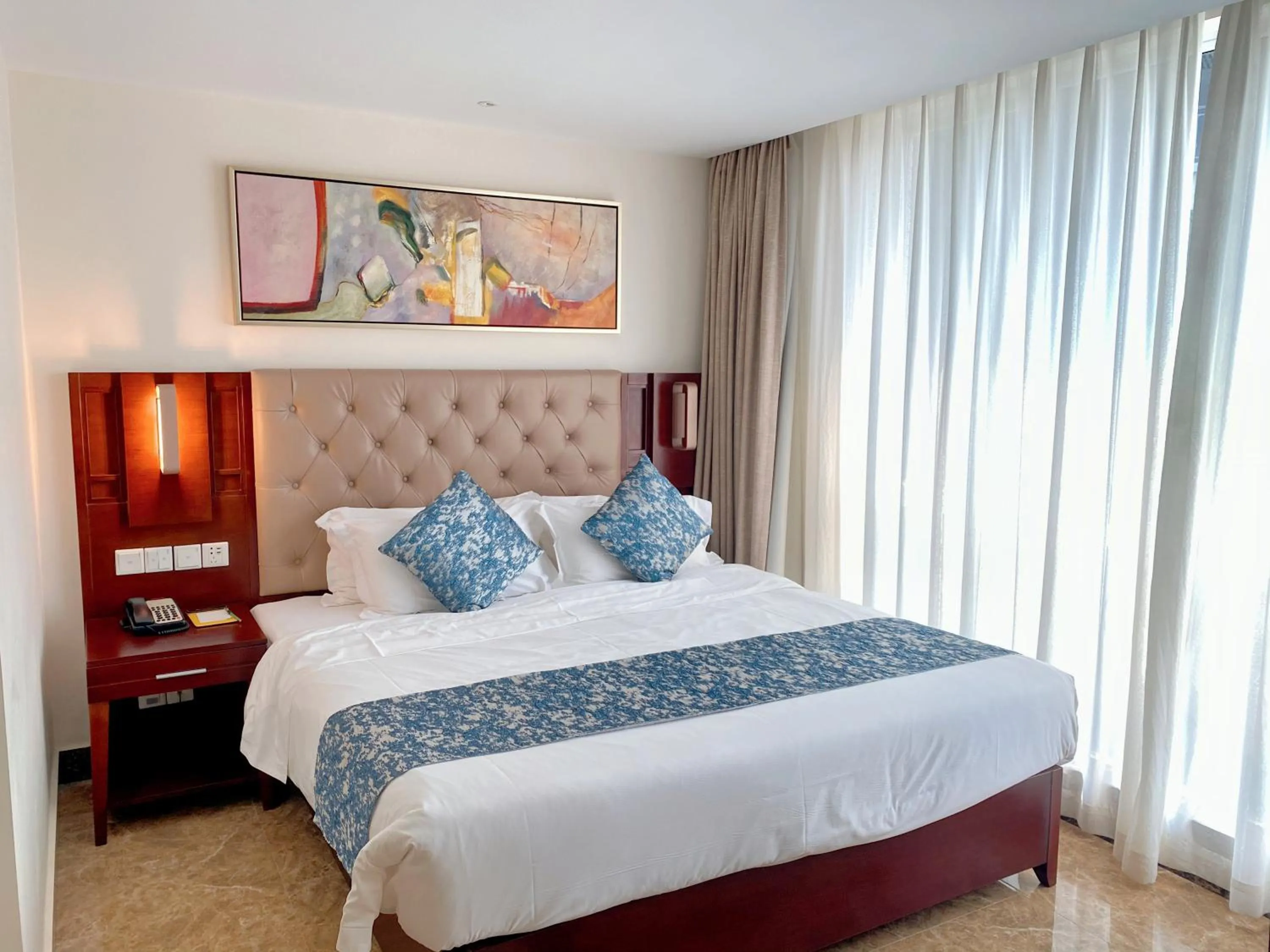 Bed in Wyndham Garden Wenchang Nanguo