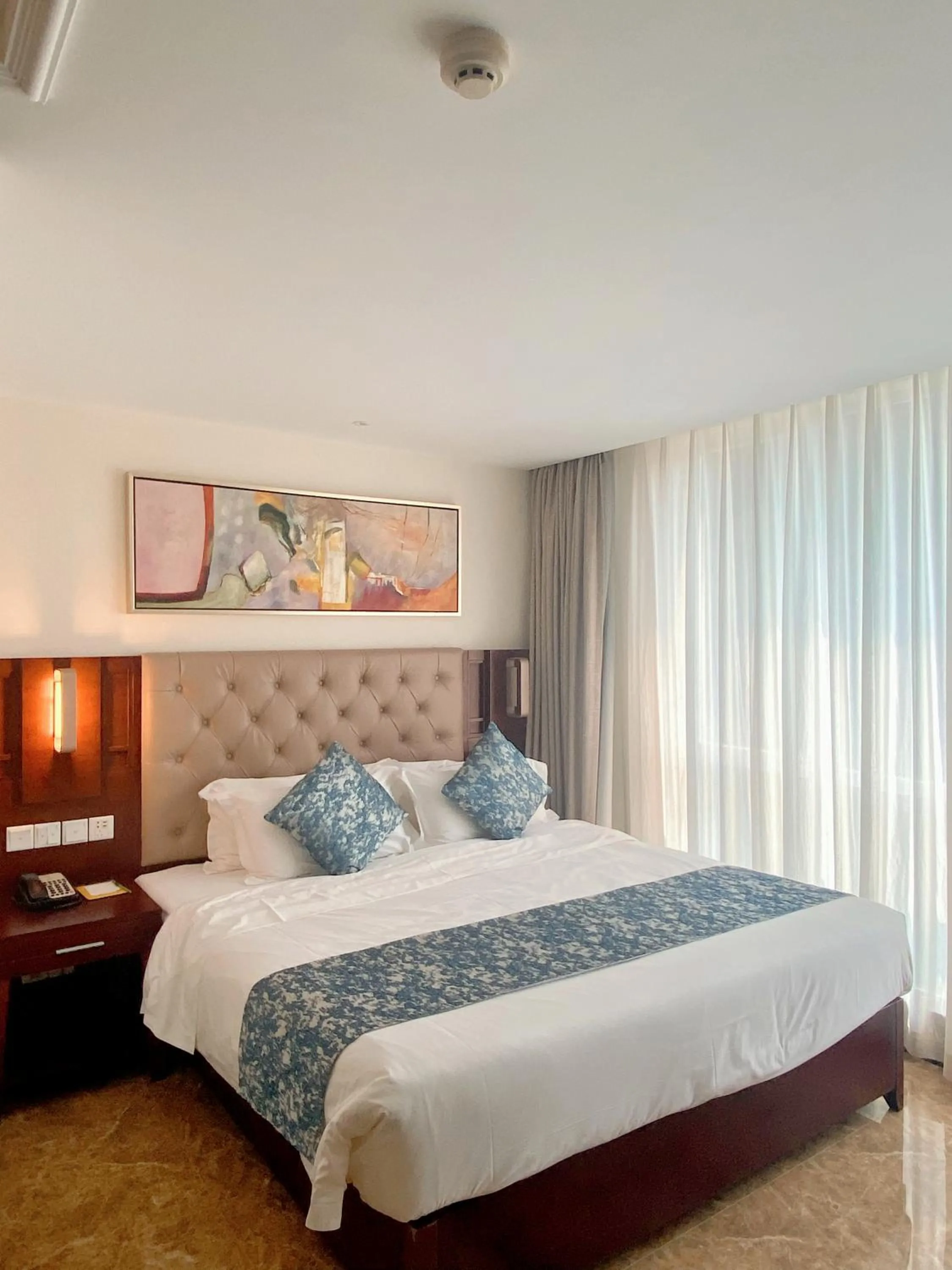 Bed in Wyndham Garden Wenchang Nanguo