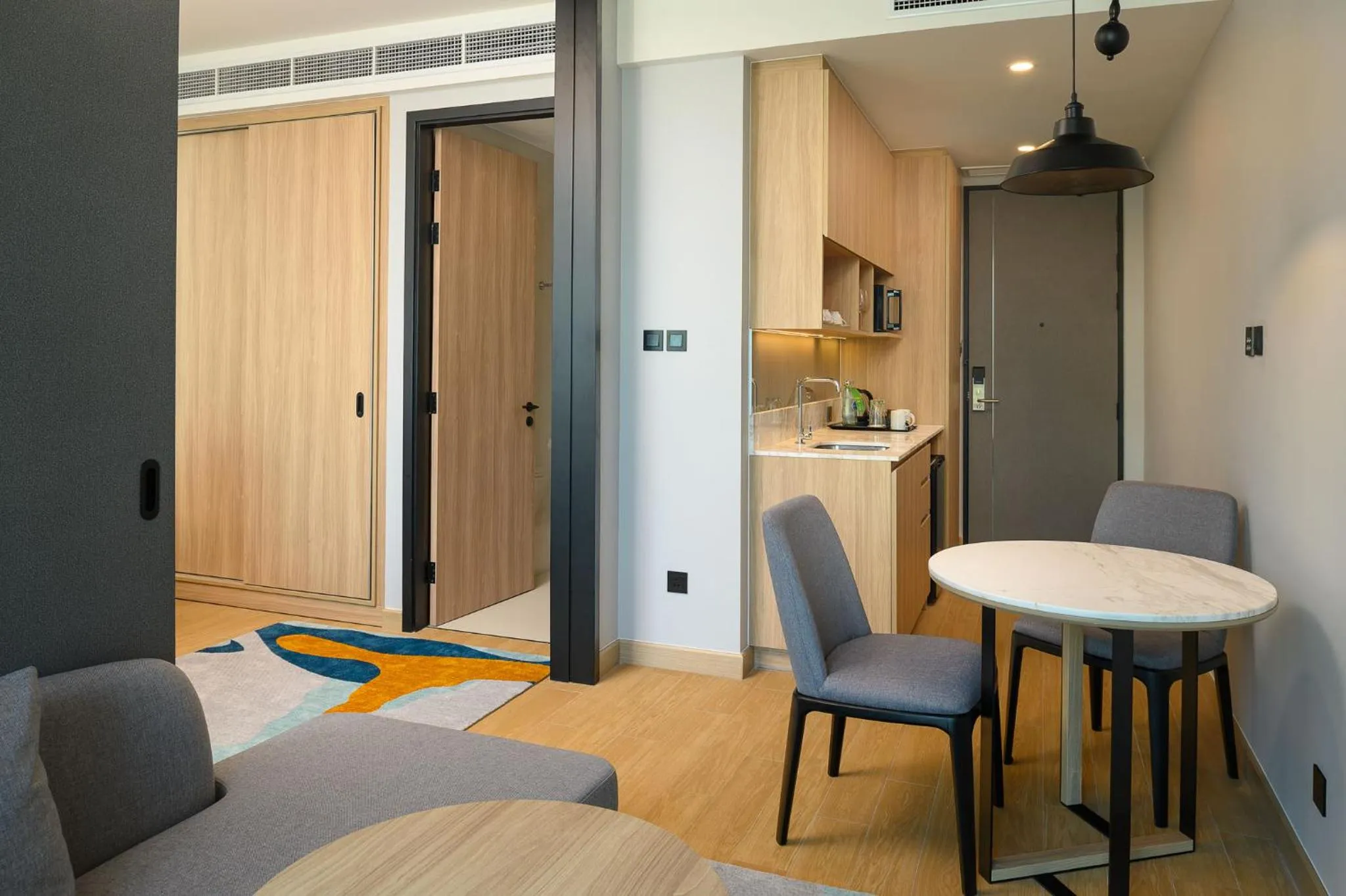 Living room in Holiday Inn & Suites Siracha Laemchabang by IHG