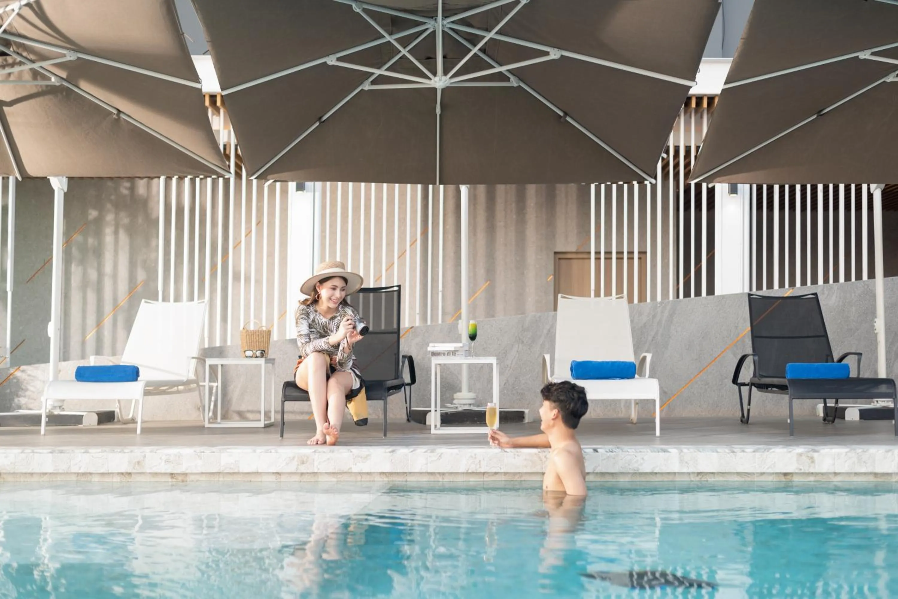 Swimming pool in Holiday Inn & Suites Siracha Laemchabang by IHG