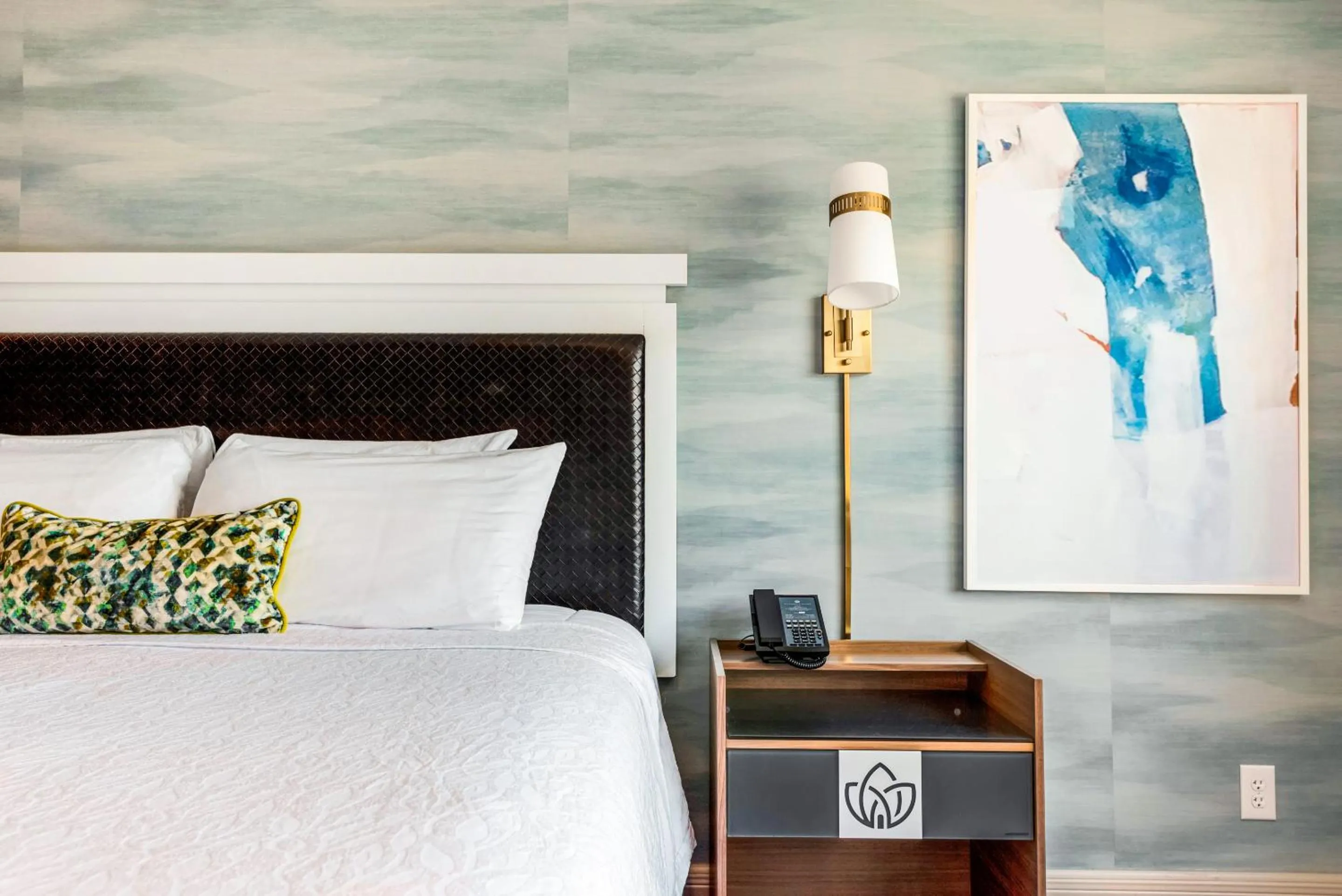 Bed in Riverwalk Plaza Hotel