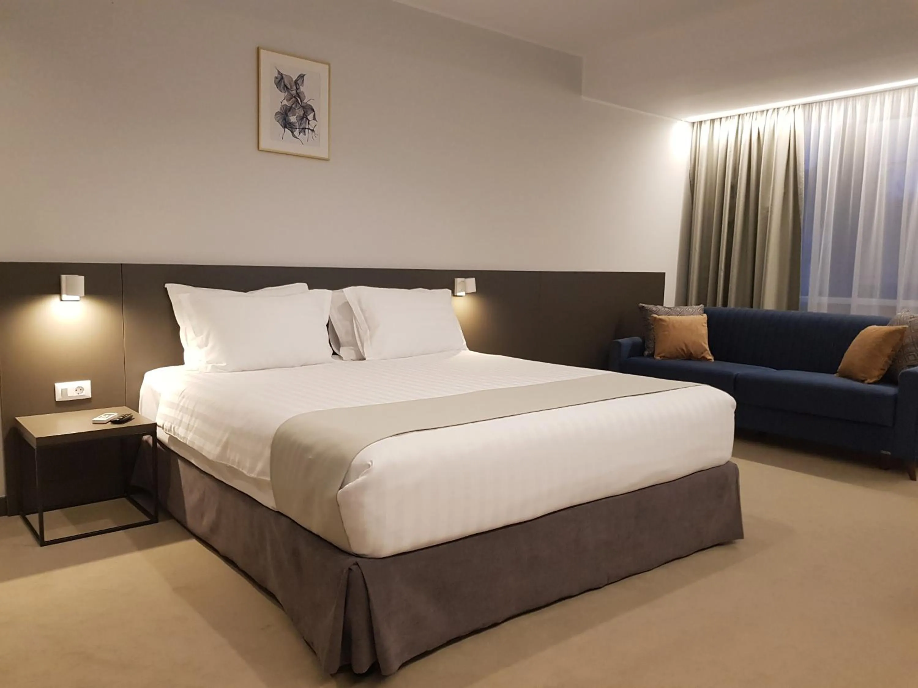 Photo of the whole room, Bed in NOVO Boutique