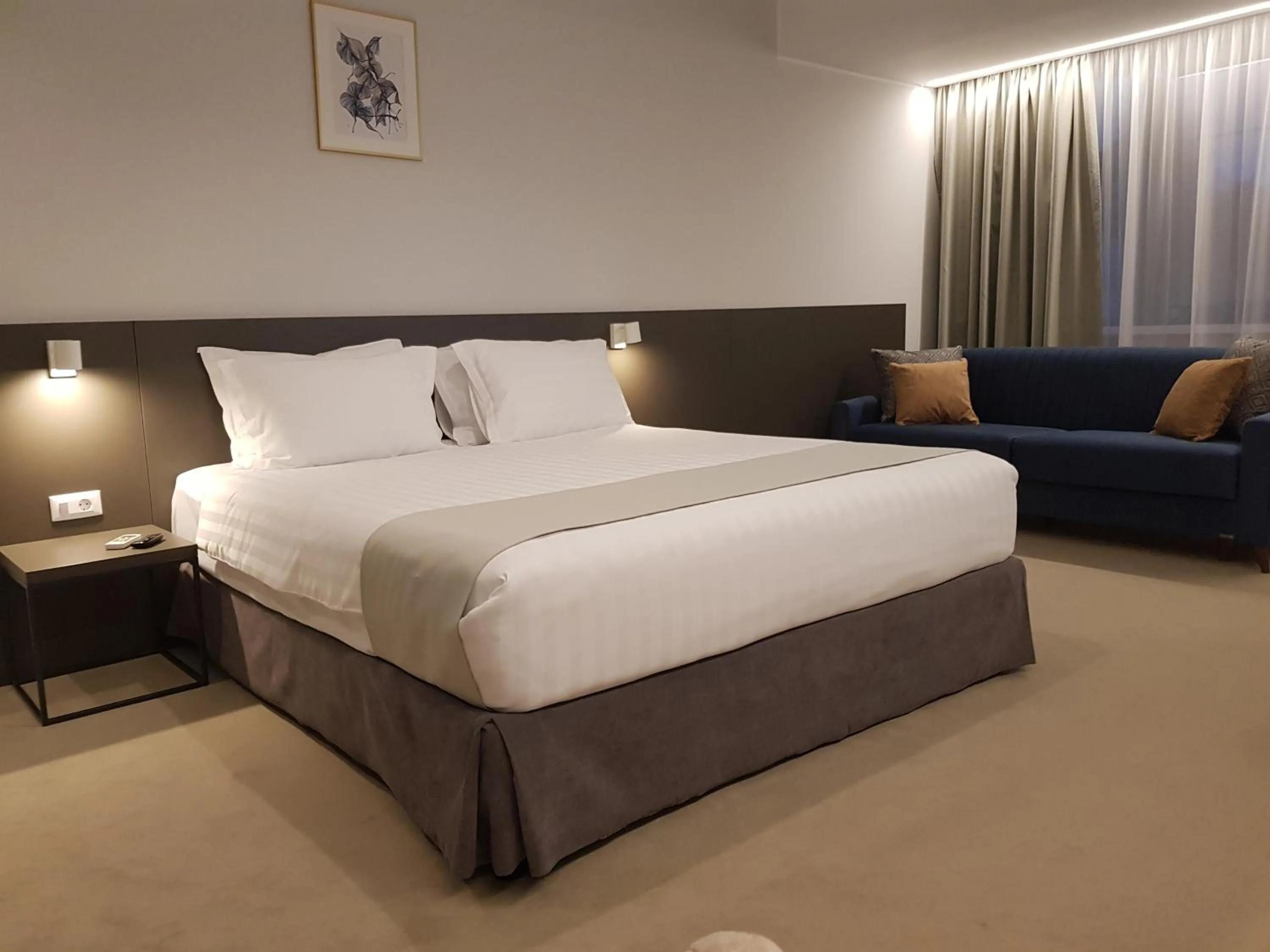 Photo of the whole room, Bed in NOVO Boutique