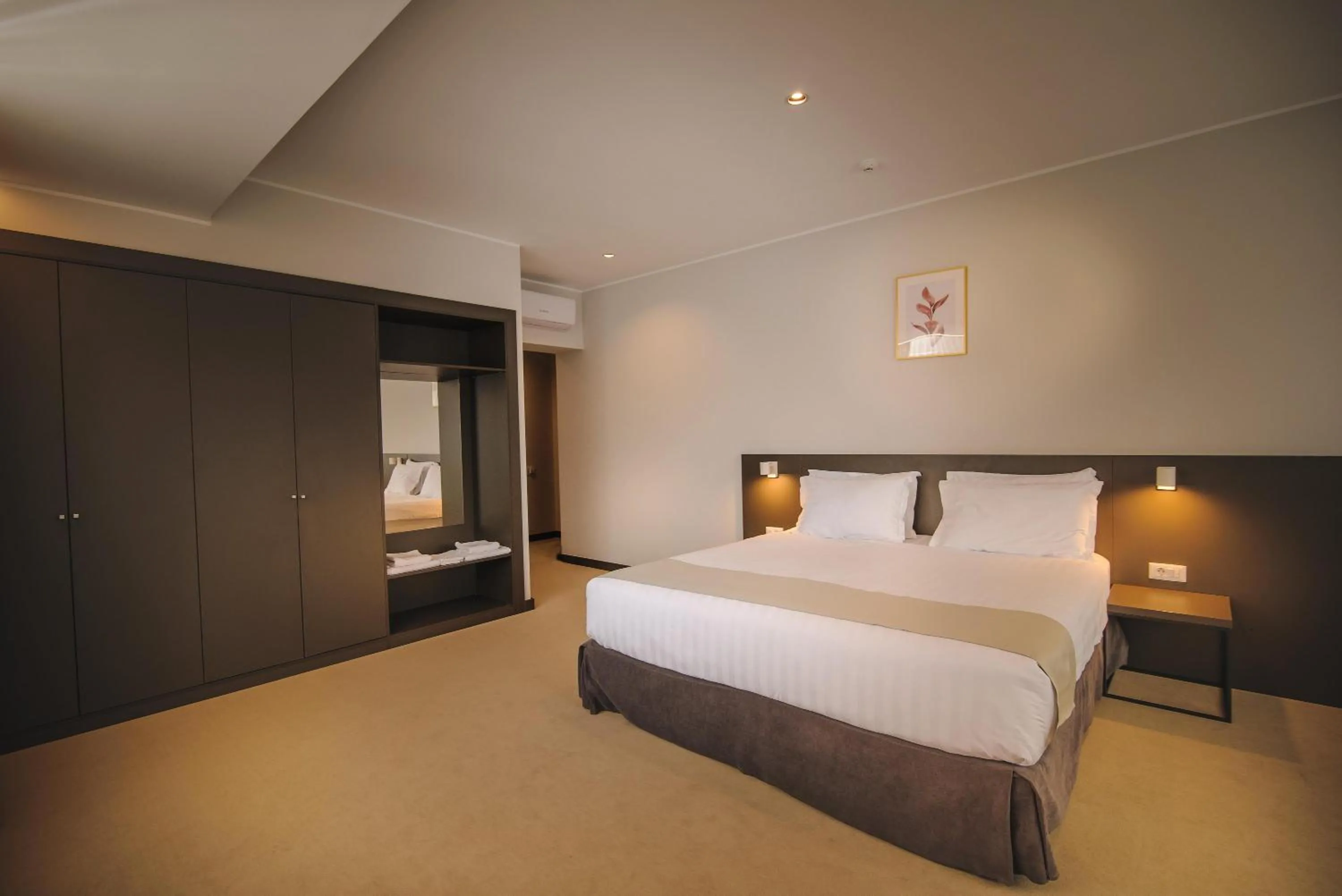 Photo of the whole room, Bed in NOVO Boutique
