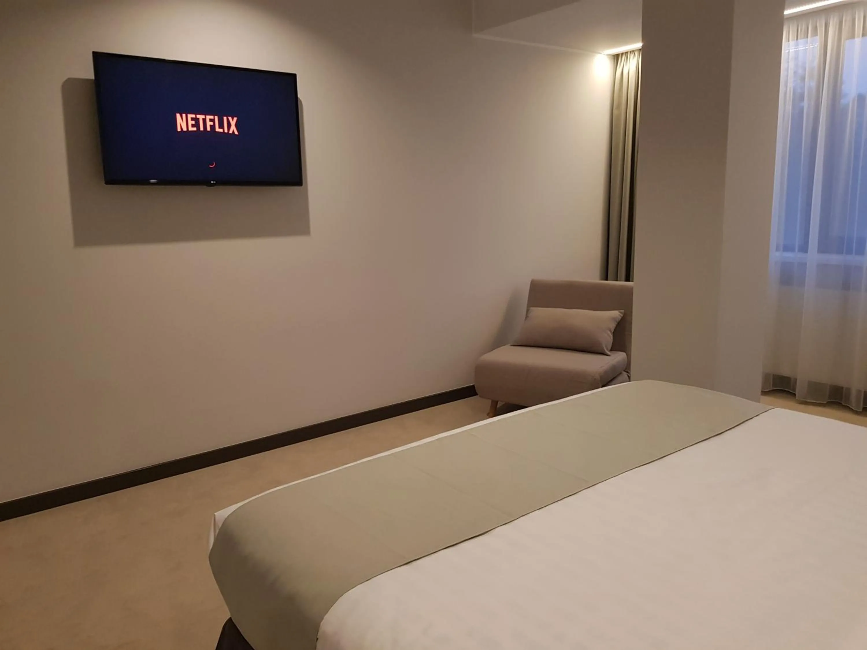 Photo of the whole room, Bed in NOVO Boutique