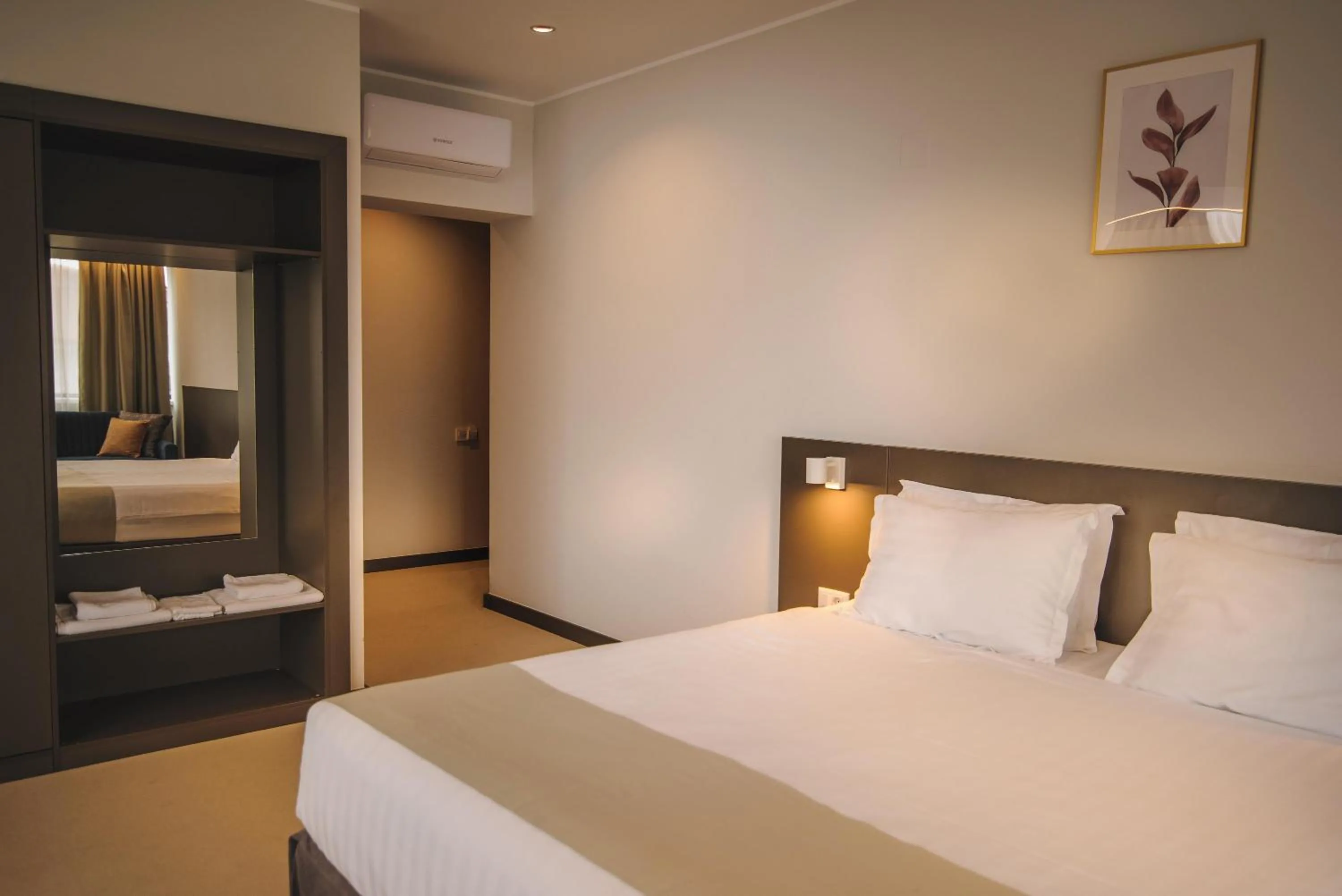 Photo of the whole room, Bed in NOVO Boutique