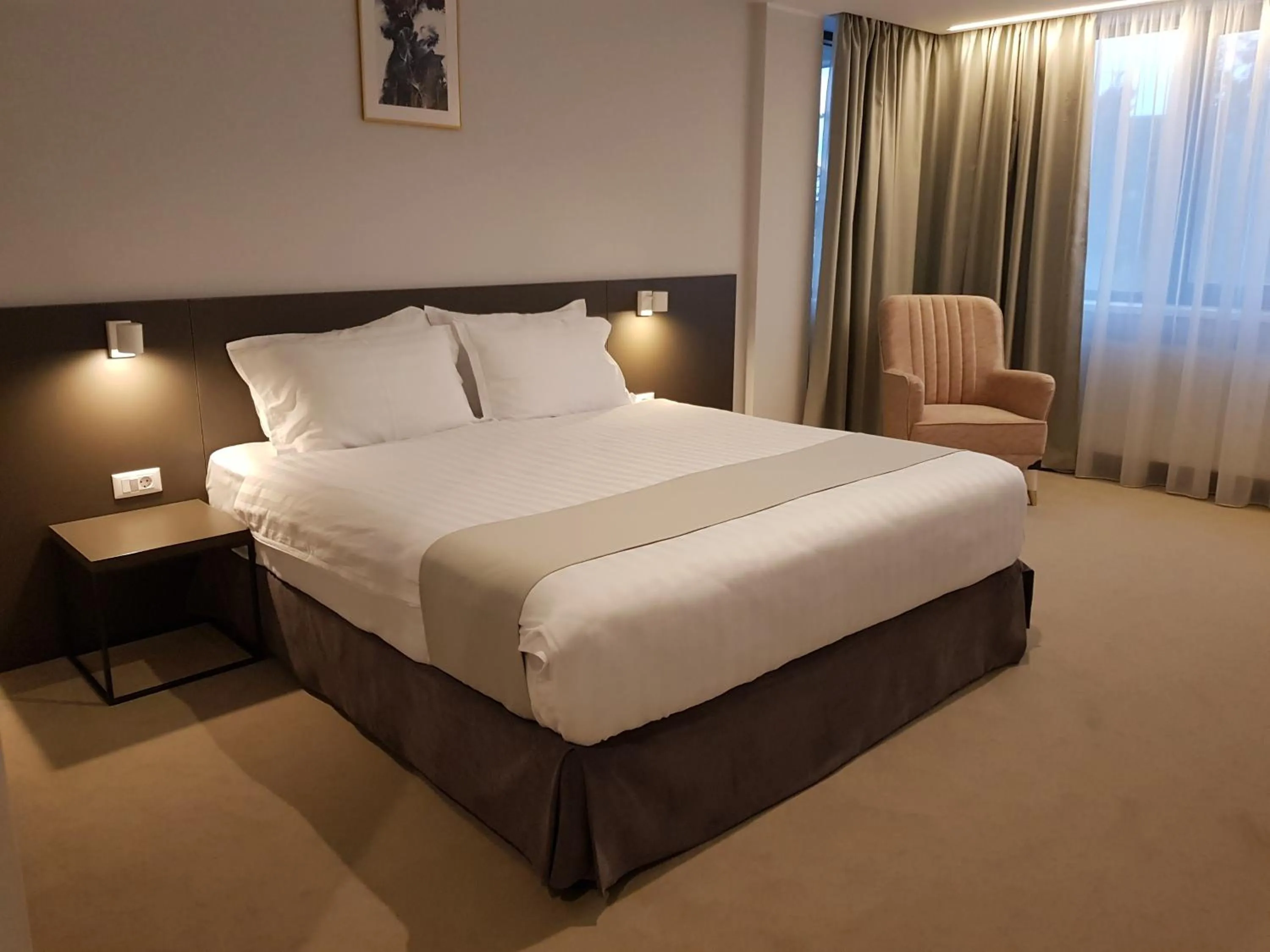 Photo of the whole room, Bed in NOVO Boutique